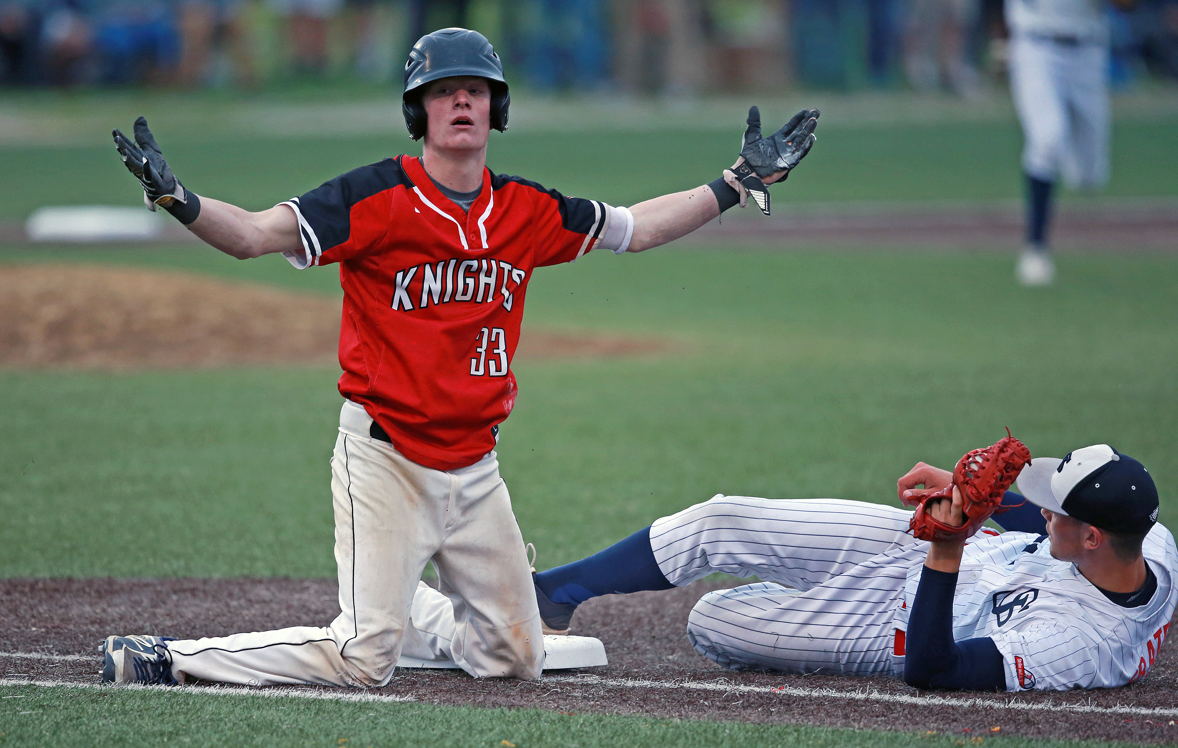North Andover's Joe Quinlan expresses his opposition to being called out on a close play at first base in the top of the third inning.