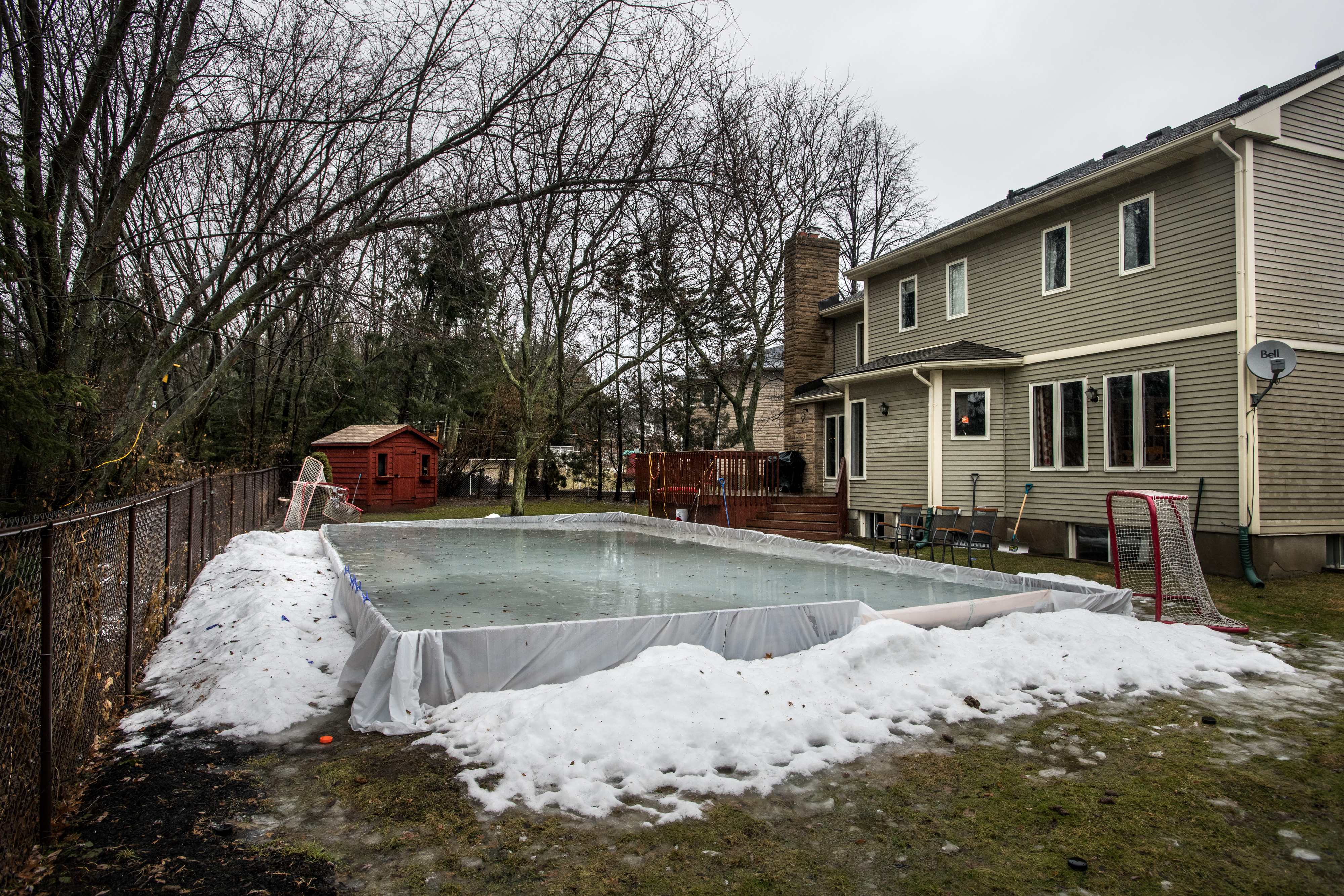 The Williams family’s melting backyard rink in Waterloo, Ontario, in February of 2018.