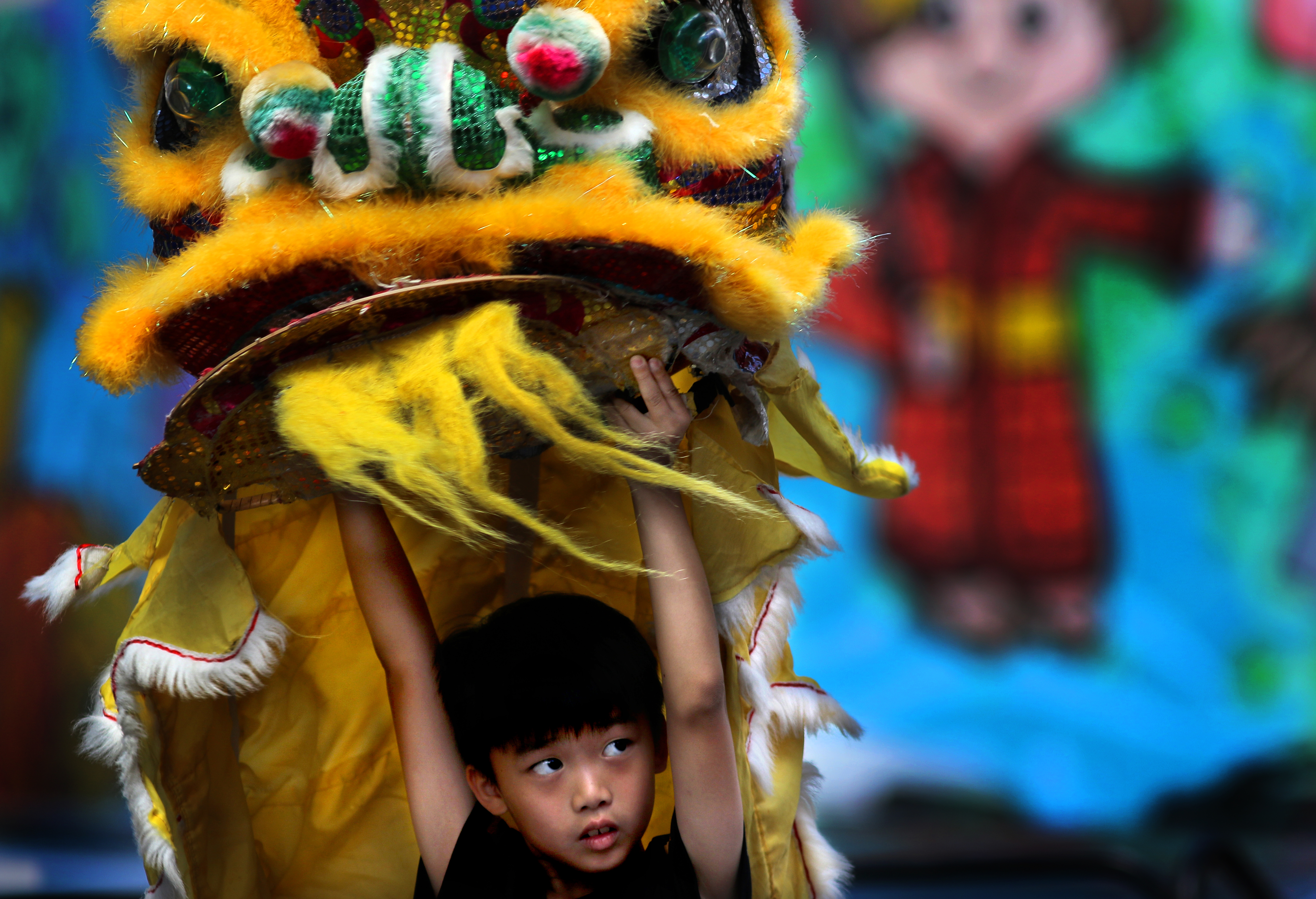 Jun Yu, 8, performed a dance on stage in Chinatown during the August Moon festival.