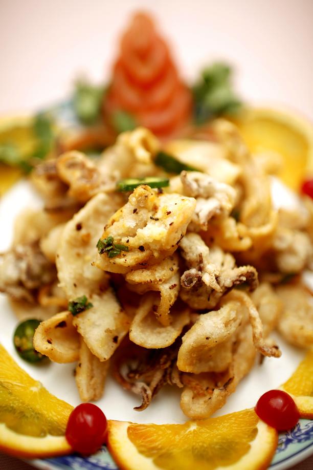 Peach Farm excels at seafood, like spicy dry-fried salted squid.