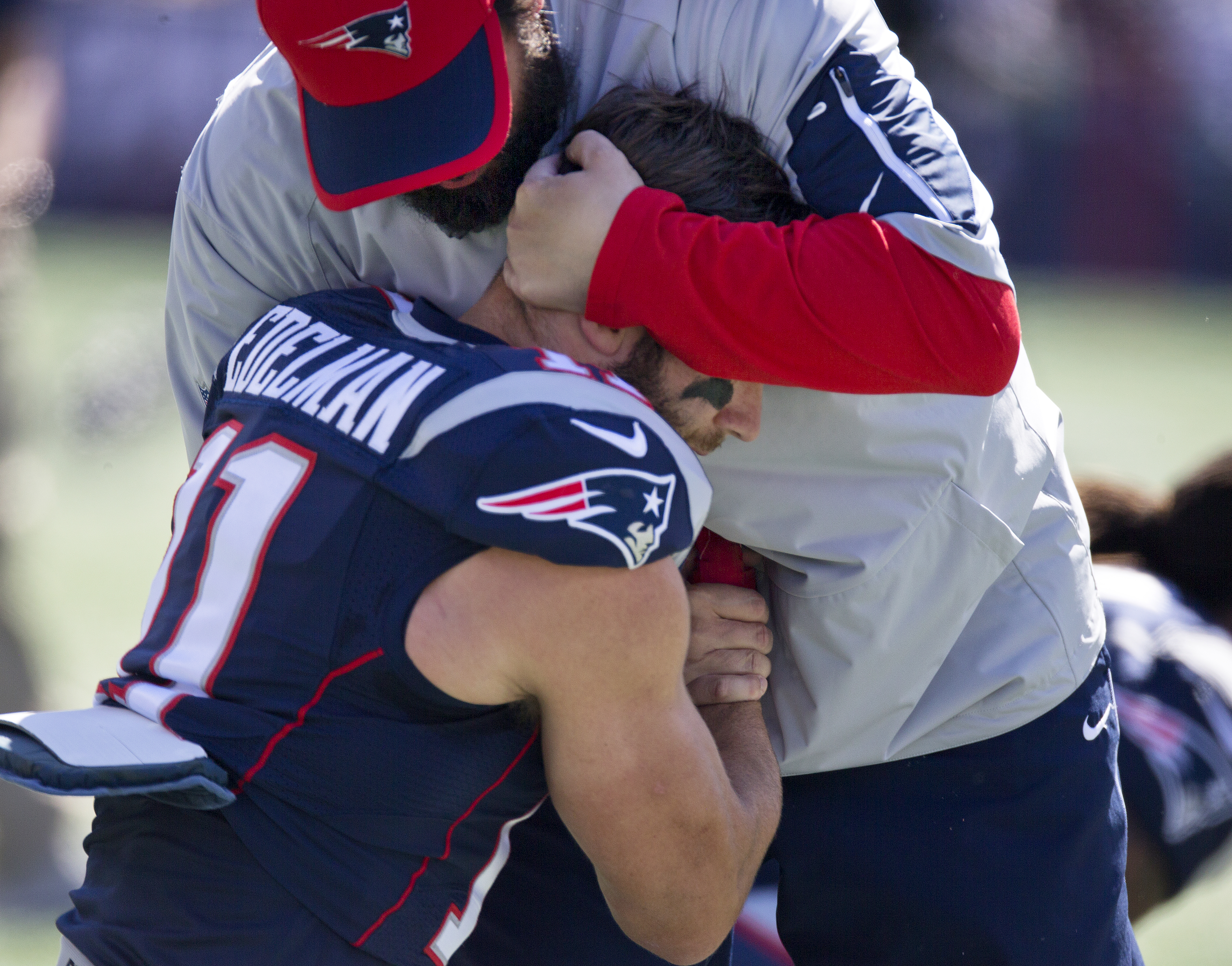 New England Patriots receiver Julian Edelman and defensive coordinator Matt Patricia shared a hug.