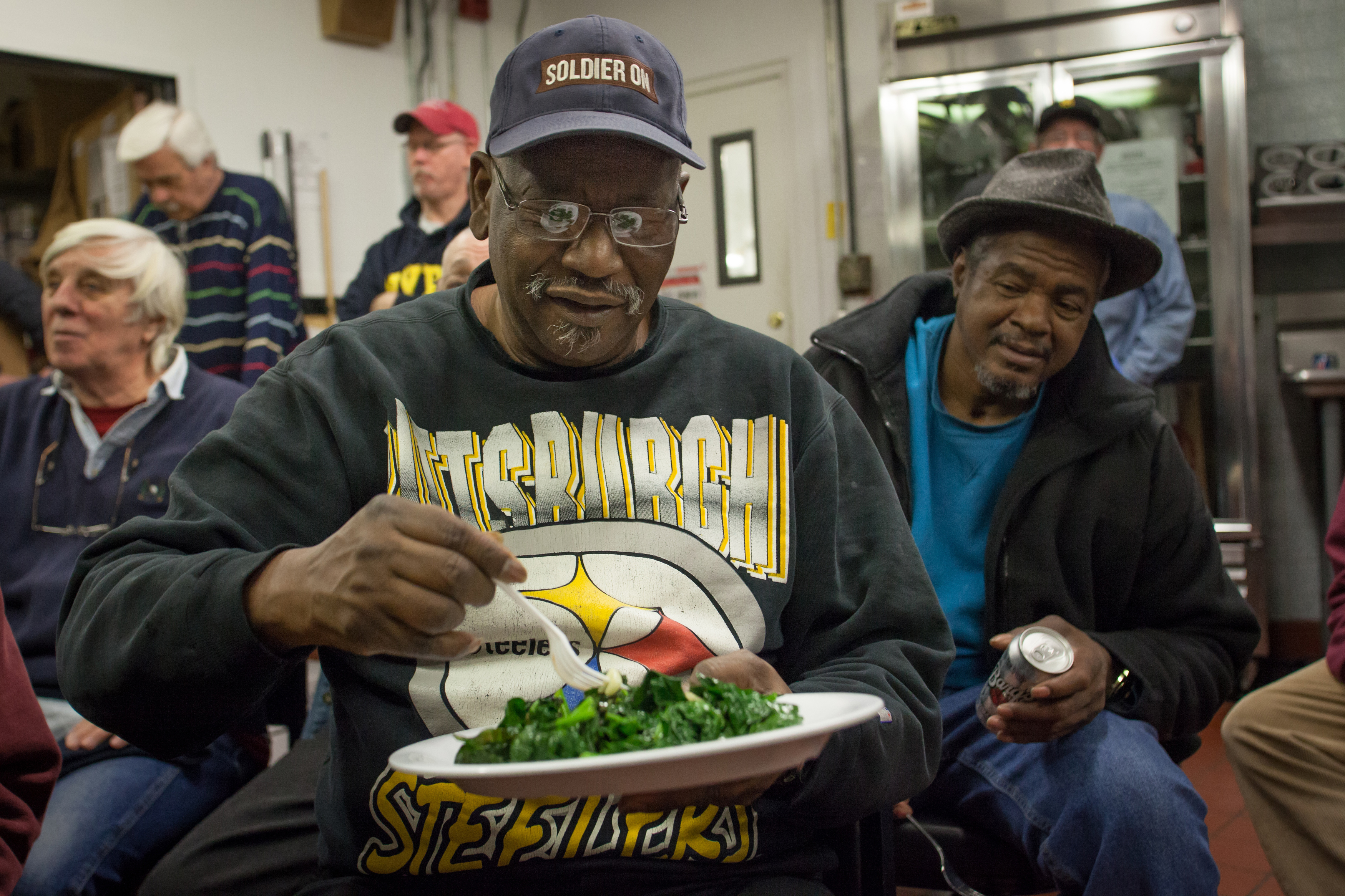 Edward Watkins dug into a plate of sauteed vegetables.