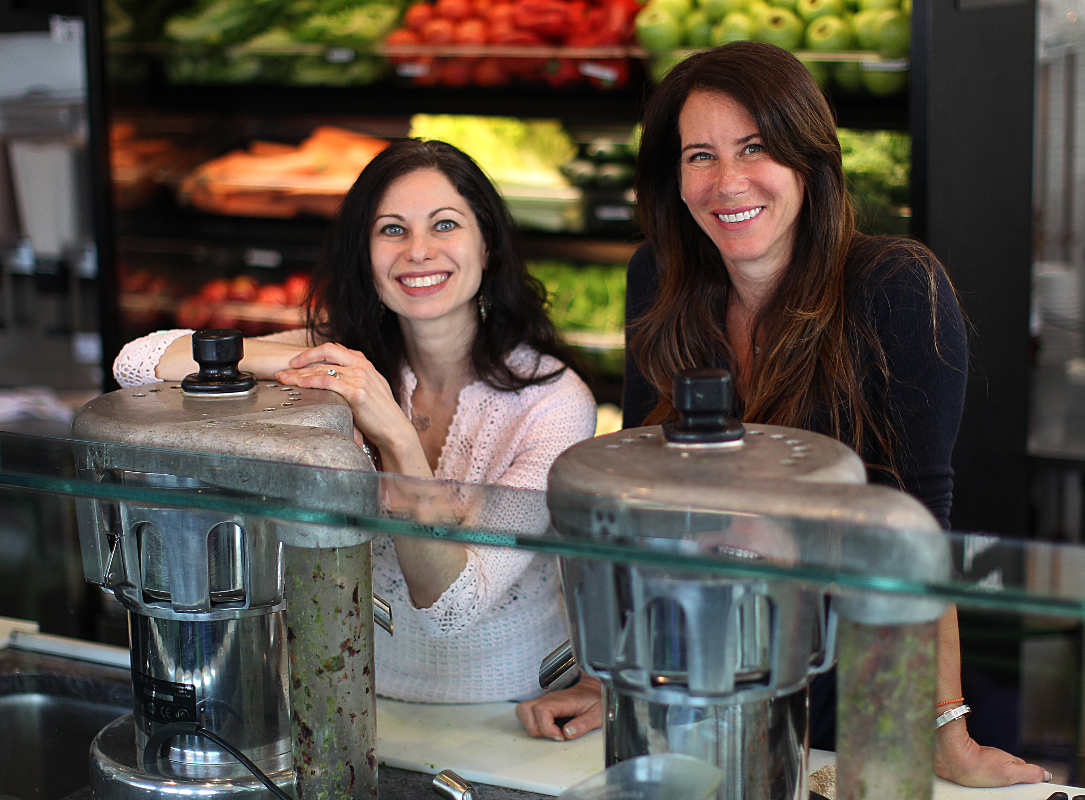 Stacy Kennedy (left) and Stacy Madison at their Stacy’s Juicebar in Needham.
