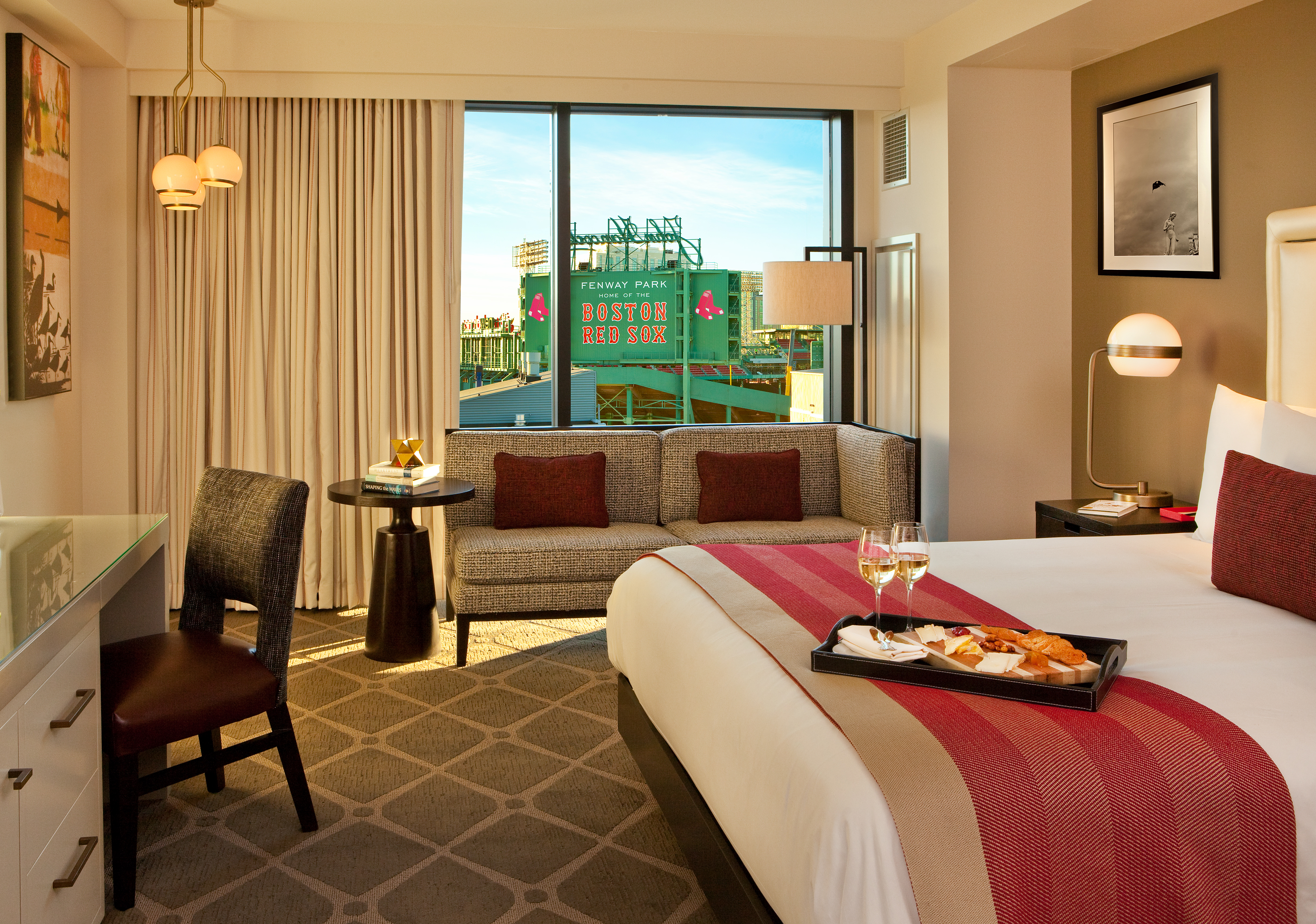 A guest room at the Hotel Commonwealth with Fenway Park as the view.