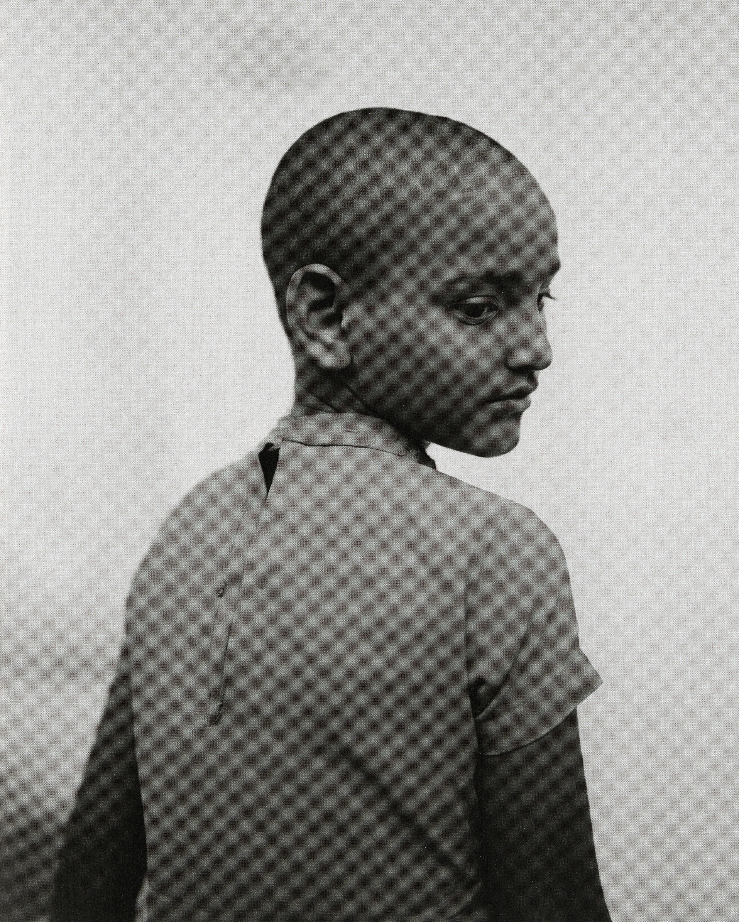 “Simram, homeless shelter, Delhi, India” by Fazal Sheikh.