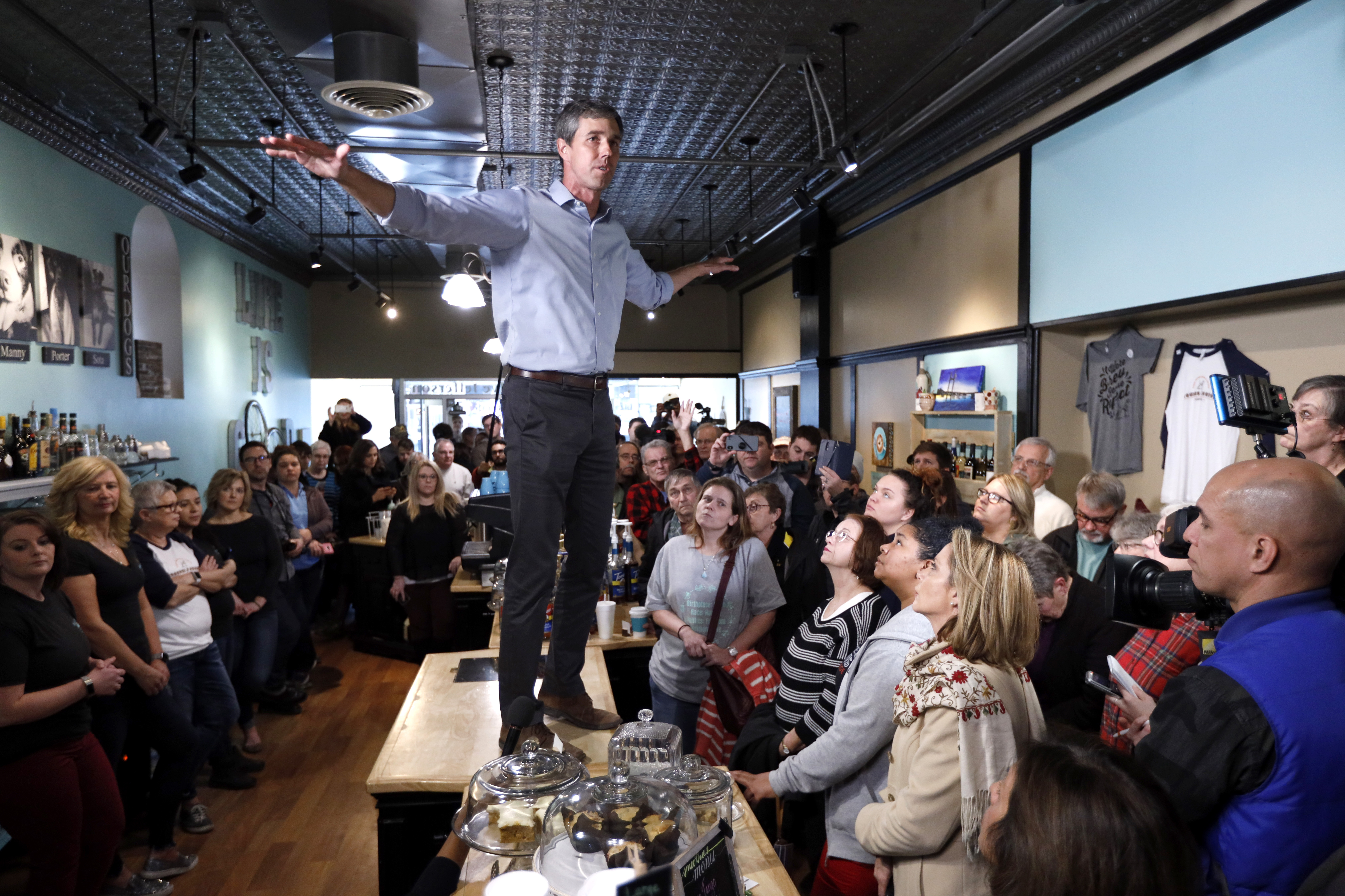 O’Rourke turned a countertop at the Beancounter Coffeehouse & Drinkery in Burlington, Iowa, into something like a surfboard, extending his arms as if riding a gnarly wave at a meet-and-greet.