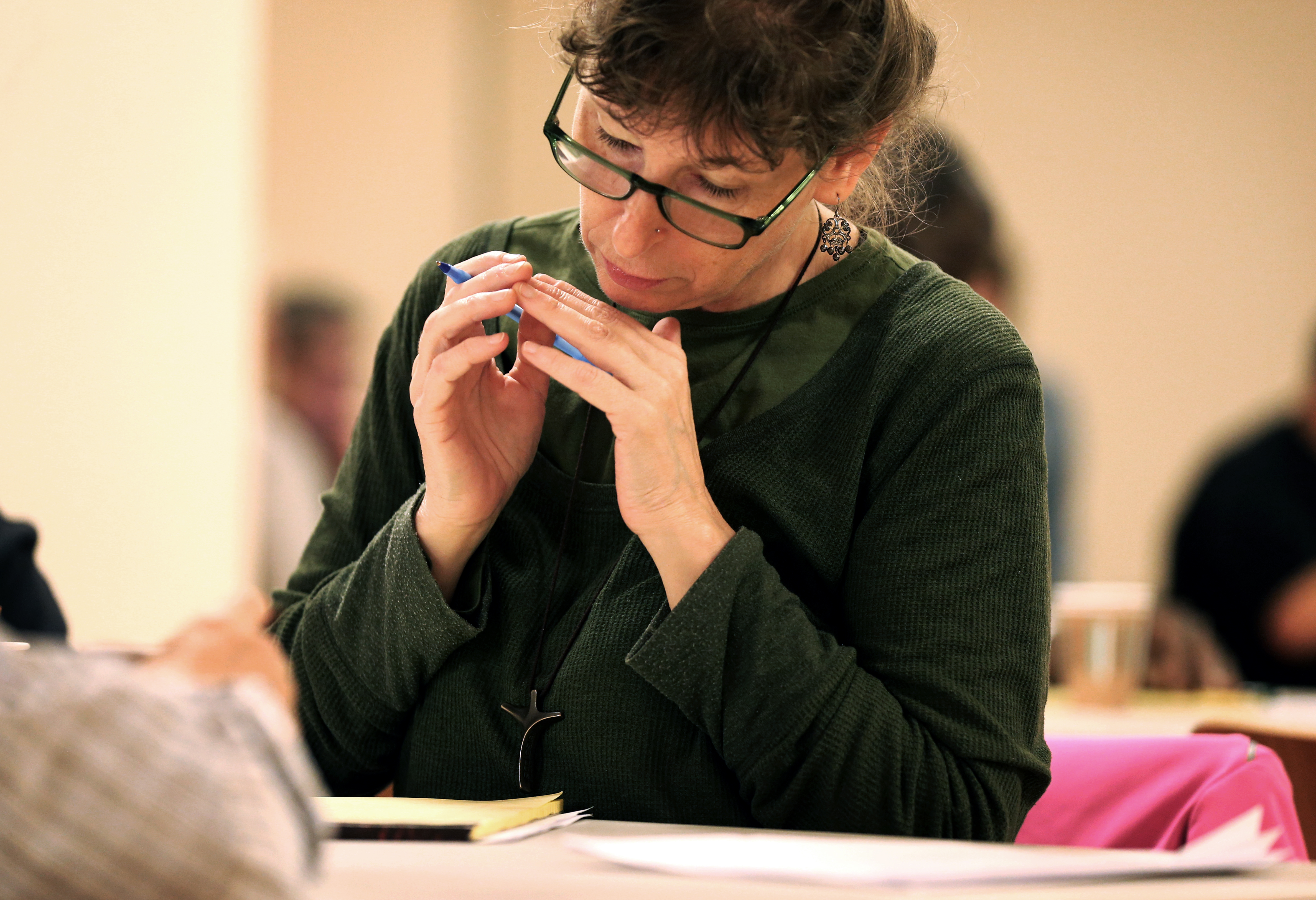 Madonna Arsenault works on her latest piece.