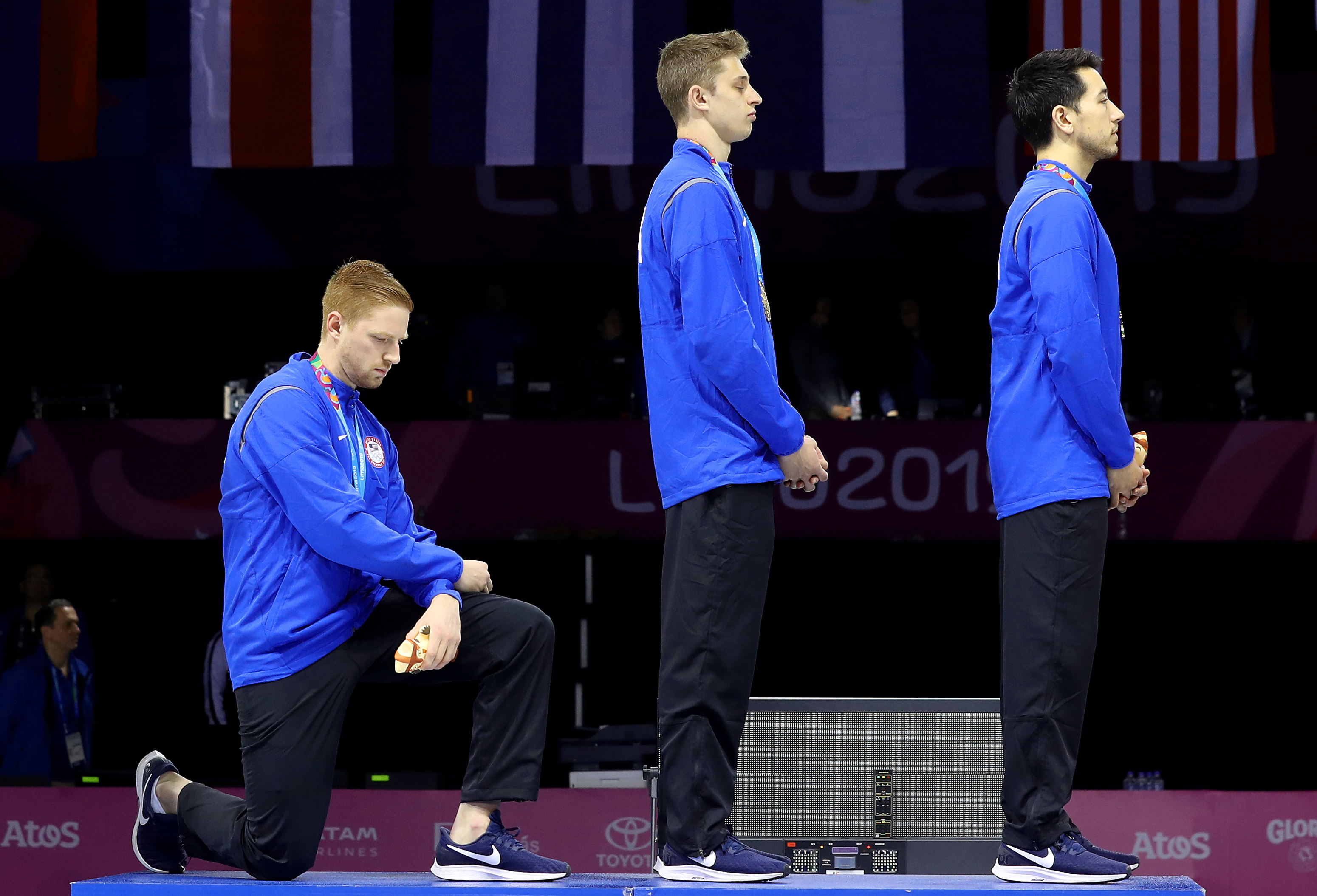 Race Imboden took a knee on the podium and the Pan American Games last summer.