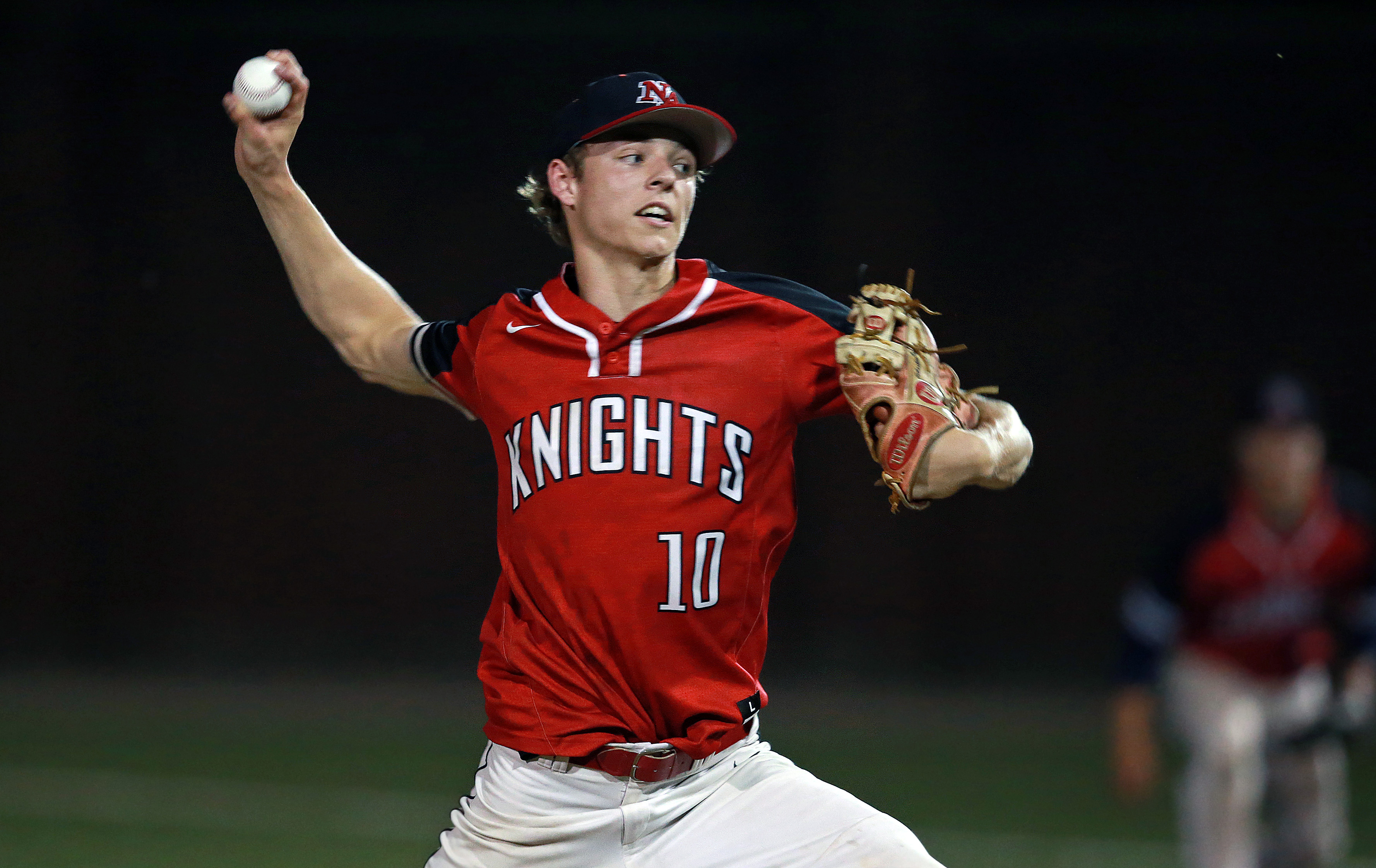 North Andover pitcher Sebastian Keane fires an eighth inning pitch.