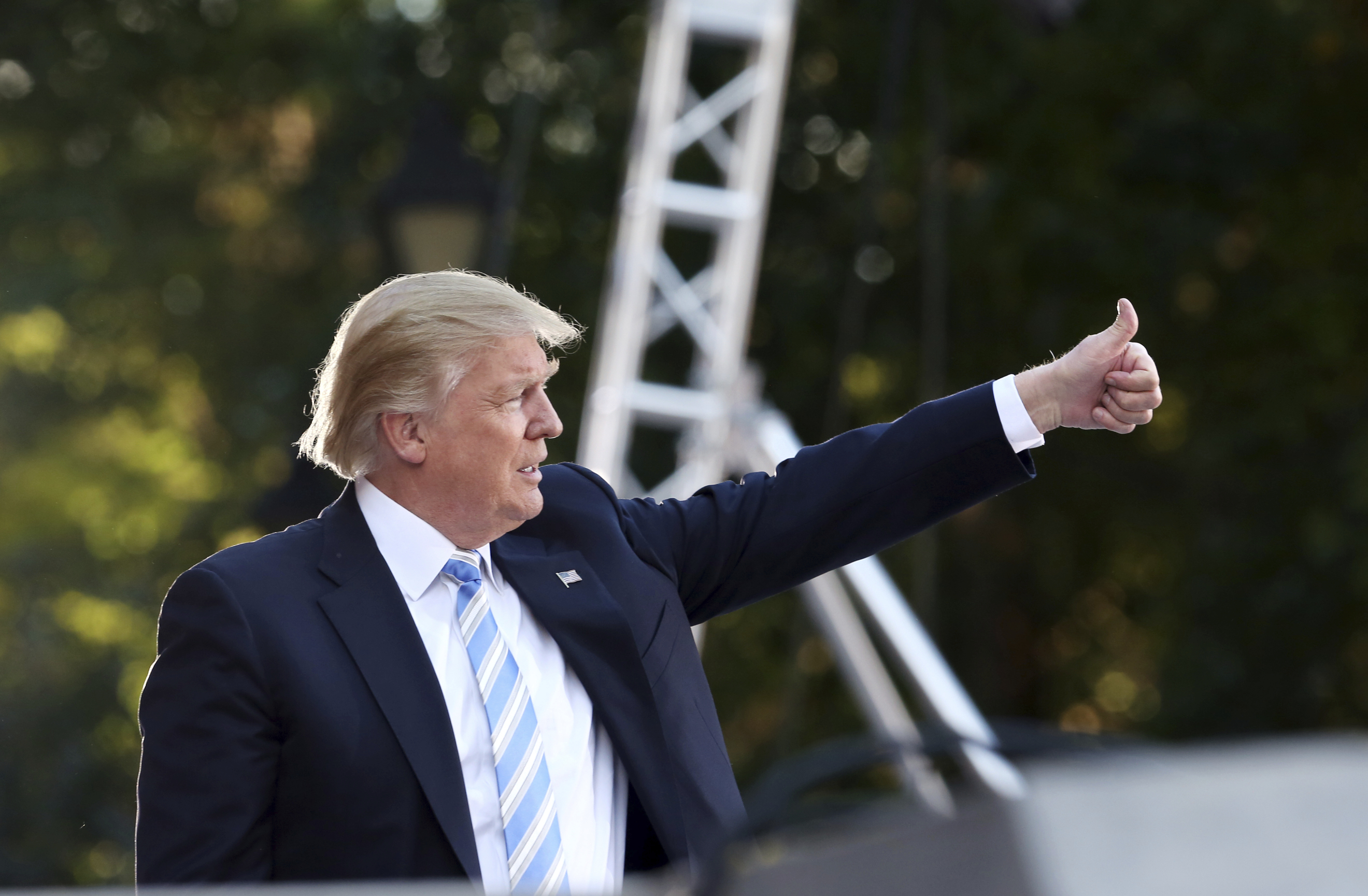 Trump reacted to supporters after a campaign stop Saturday in Virginia Beach, Va.