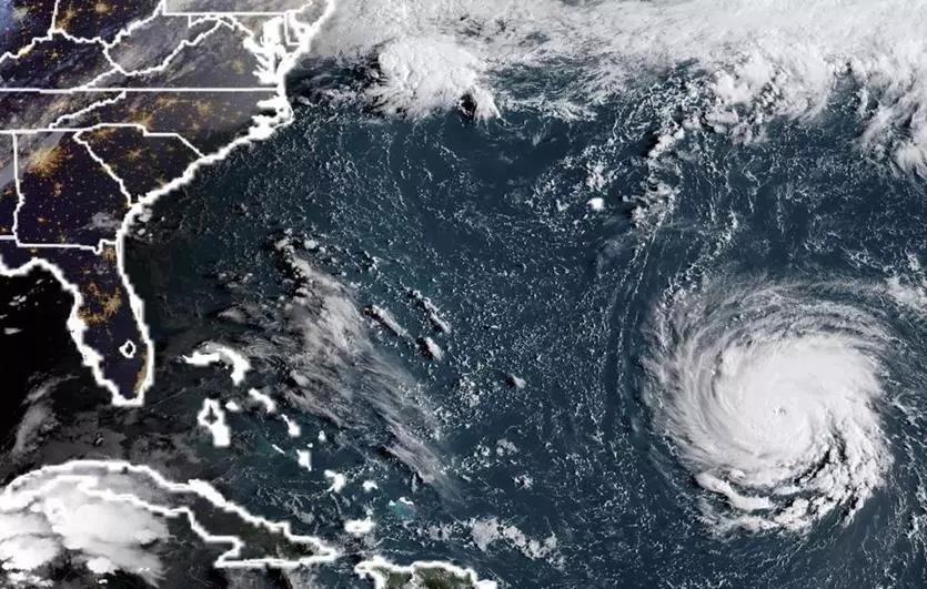 Hurricane Florence rapidly strengthened into a potentially catastrophic Category 4 storm on Monday as it closed in on North and South Carolina.