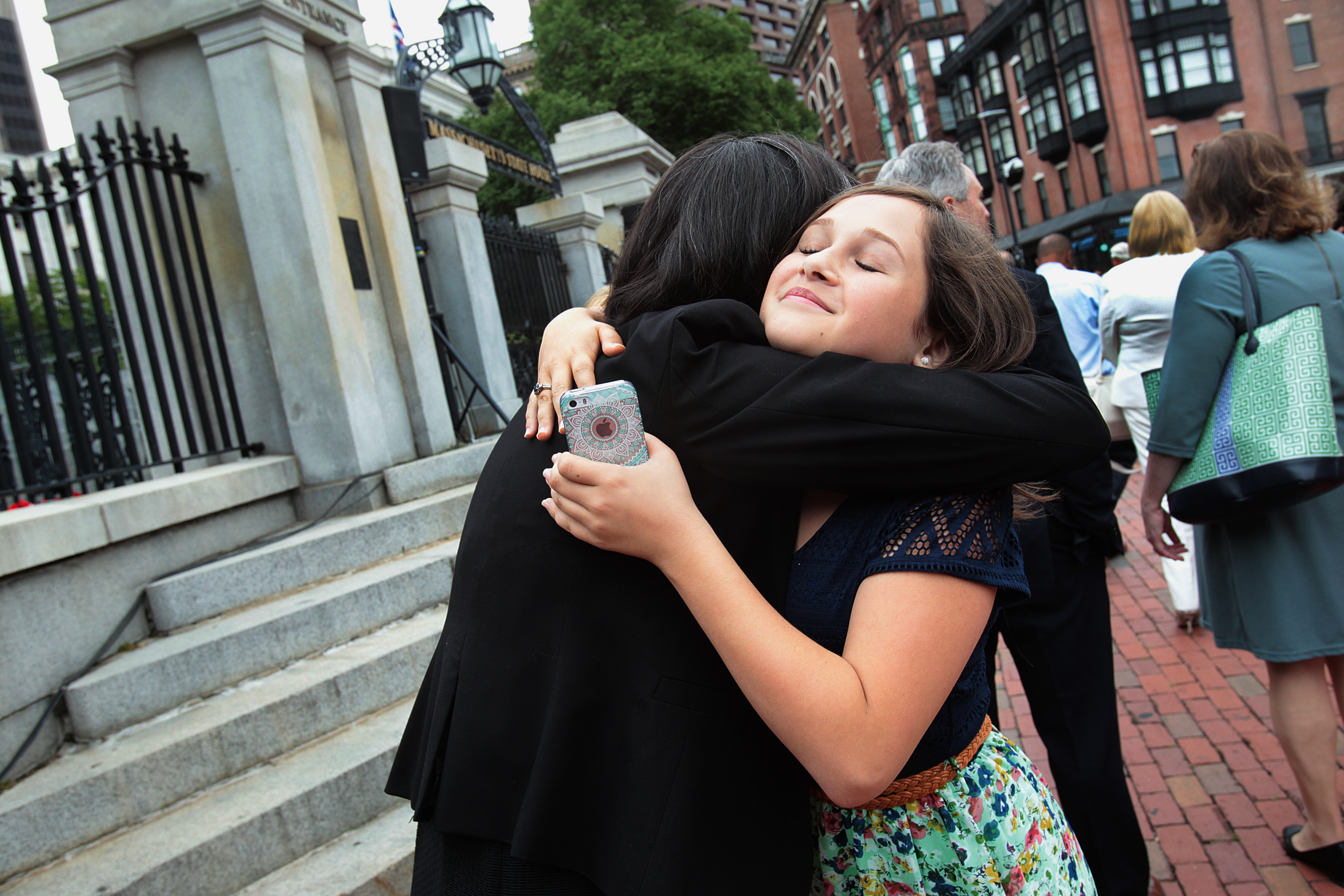 Fourteen year old Nicole Talbot celebrated the bill signing.