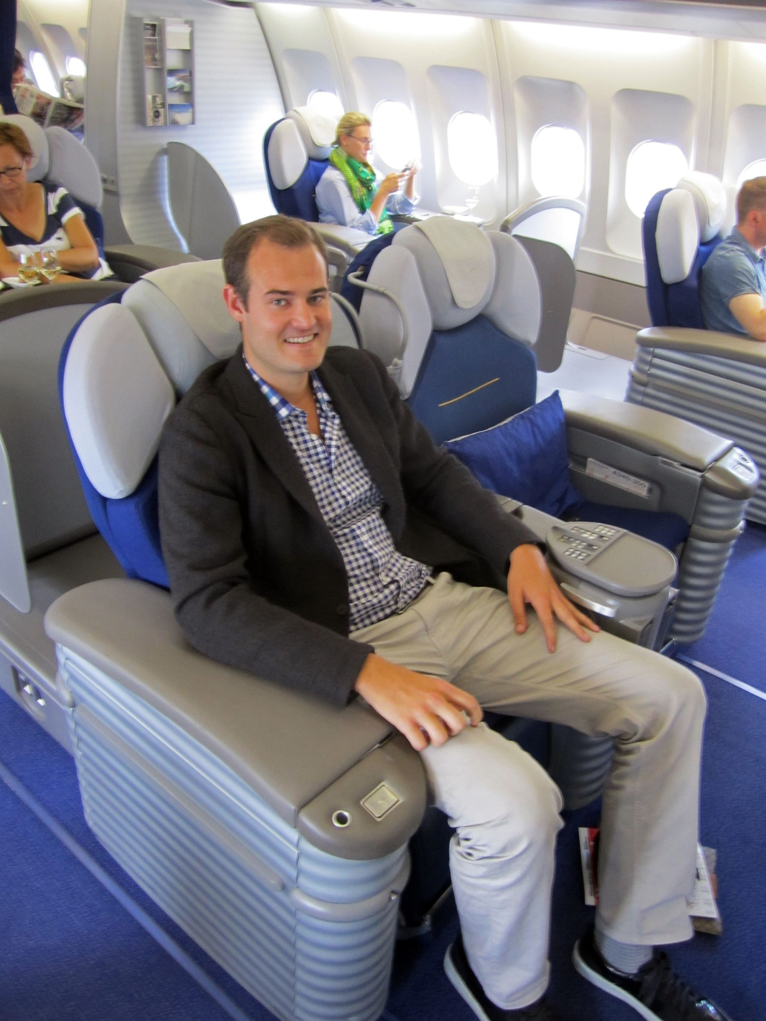 ThePointsGuy.com’s Brian Kelly uses the points he racks up to fly free and travel first-class, as here on Lufthansa.