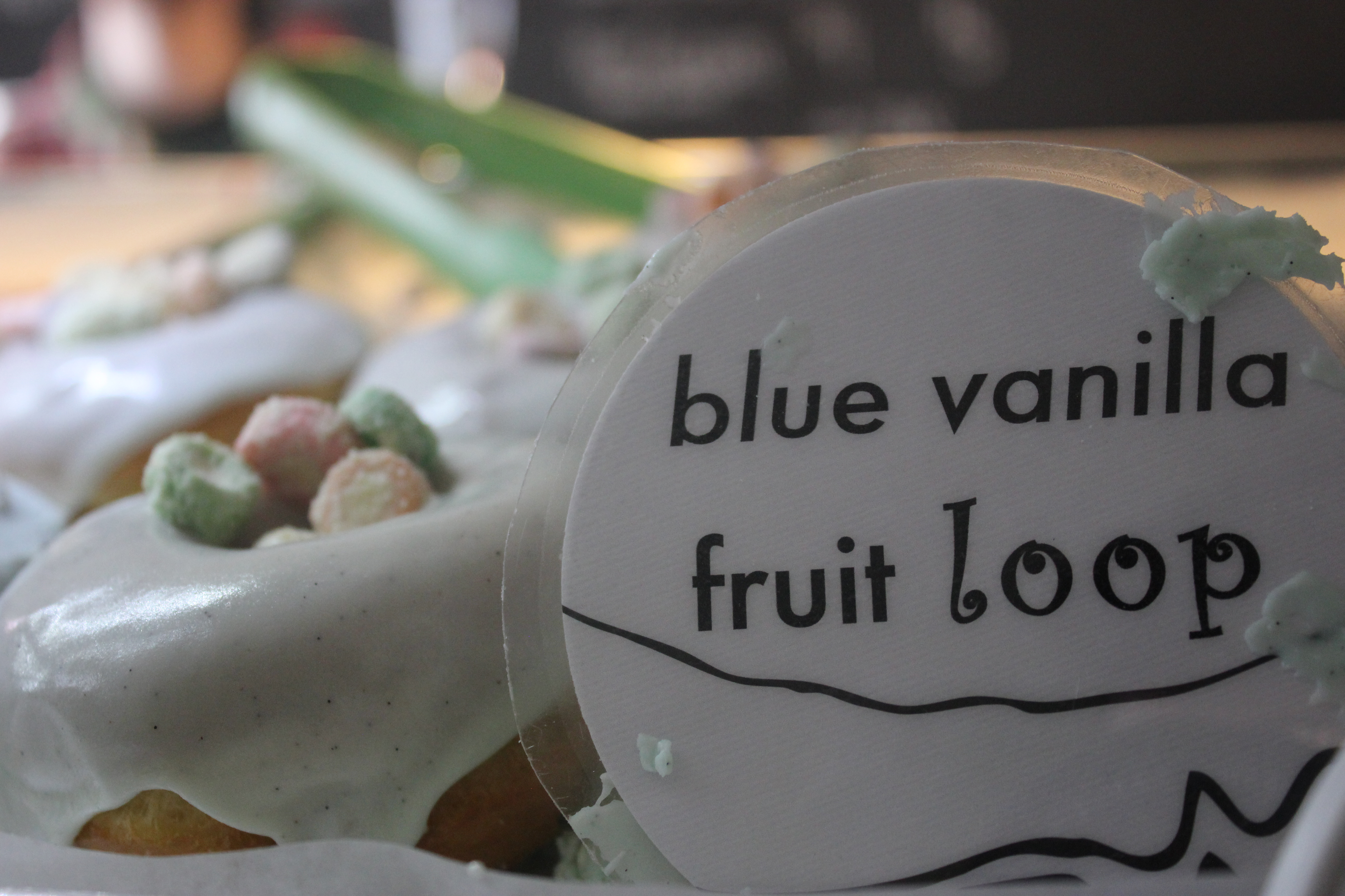 A blueberry Fruit Loop doughnut at SuzyQ Doughnuts.