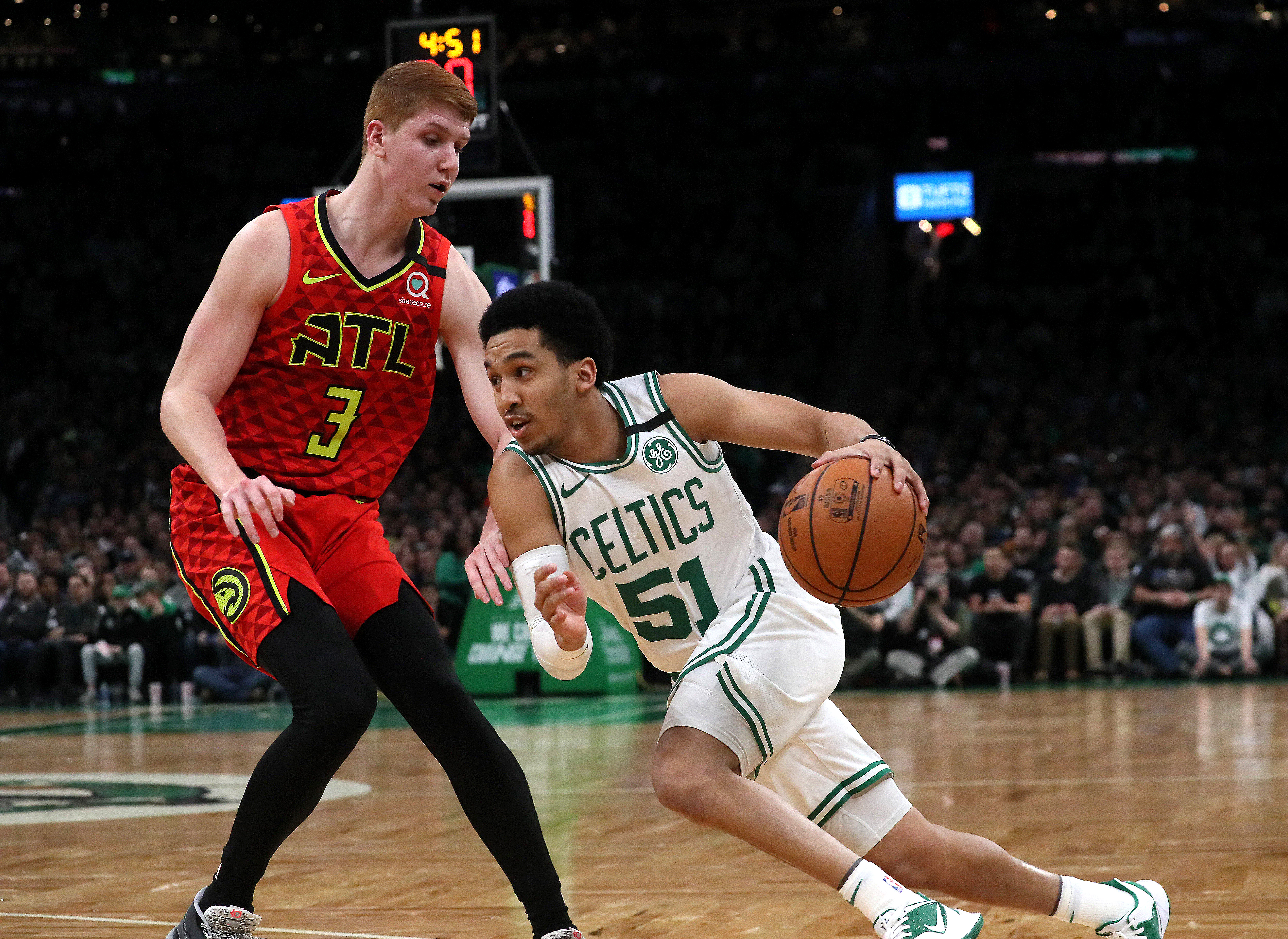 Celtics guard Tremont Waters drives on the Hawks’ Kevin Huerter during the second quarter Friday.