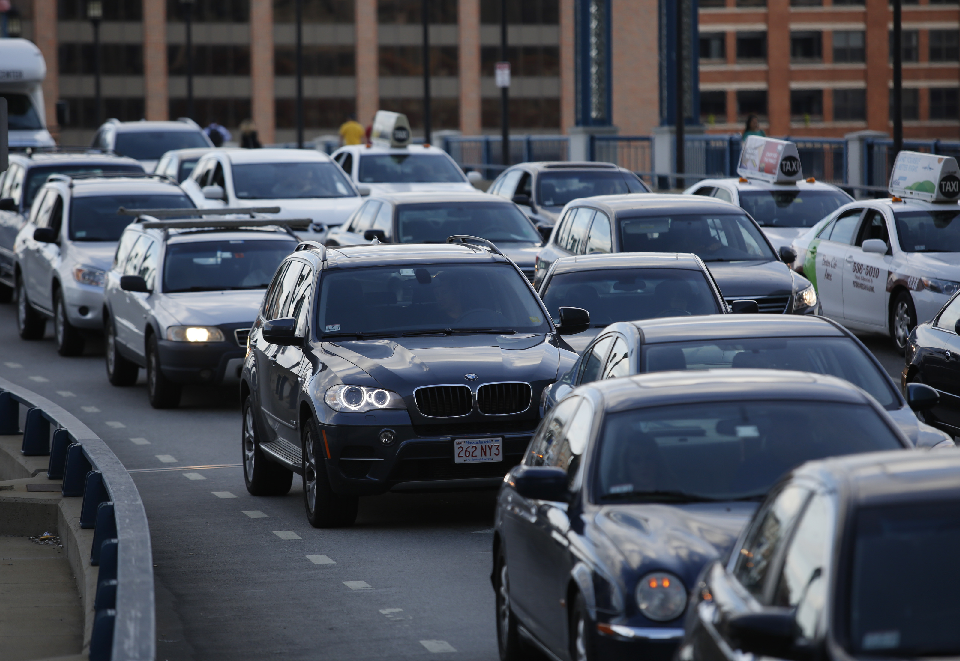 The growth that’s causing traffic problems in the Seaport District “wasn’t supposed to happen until 2025,” Mayor Thomas Menino said.