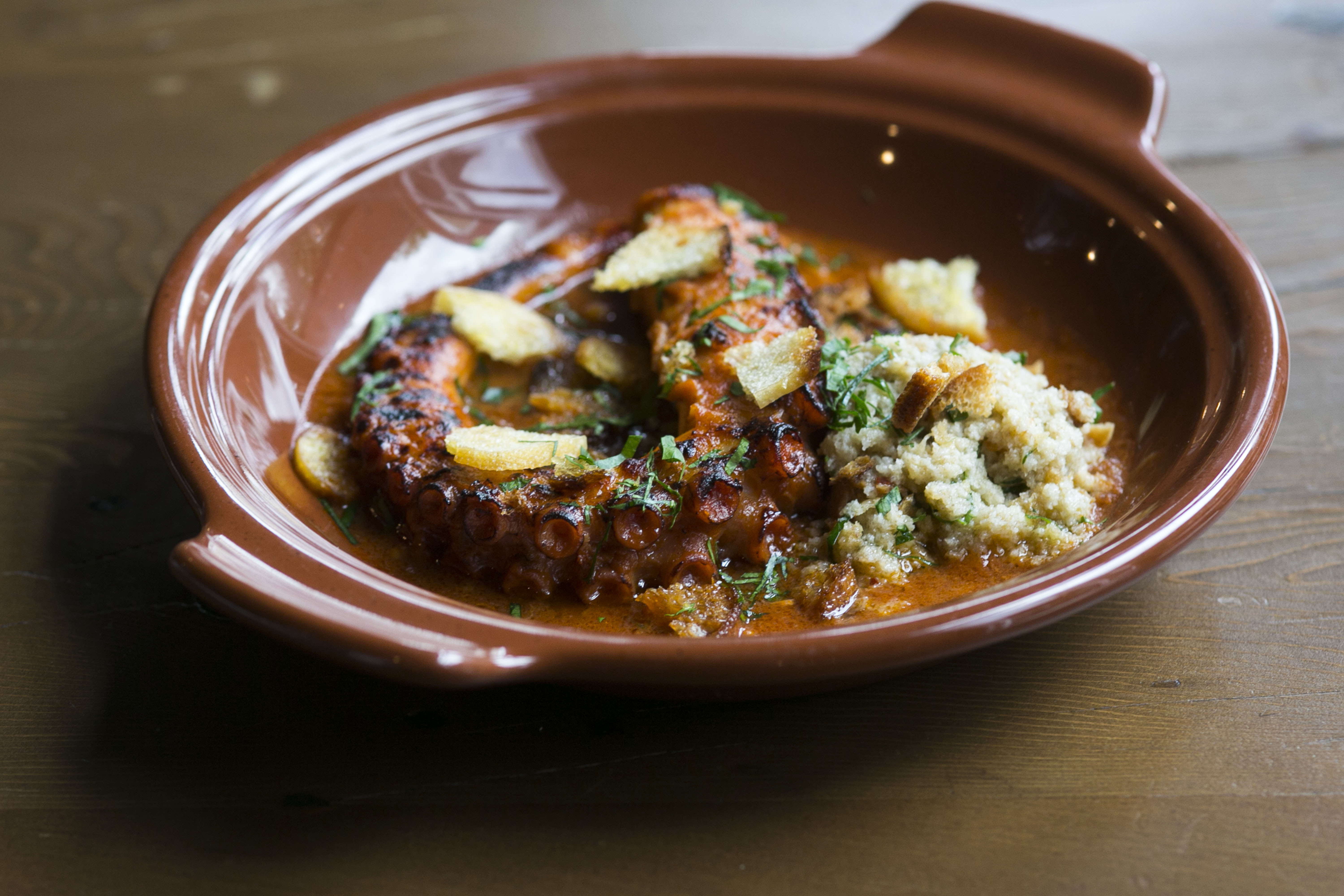 Octopus “affogato” braised in a tomato-based sauce.