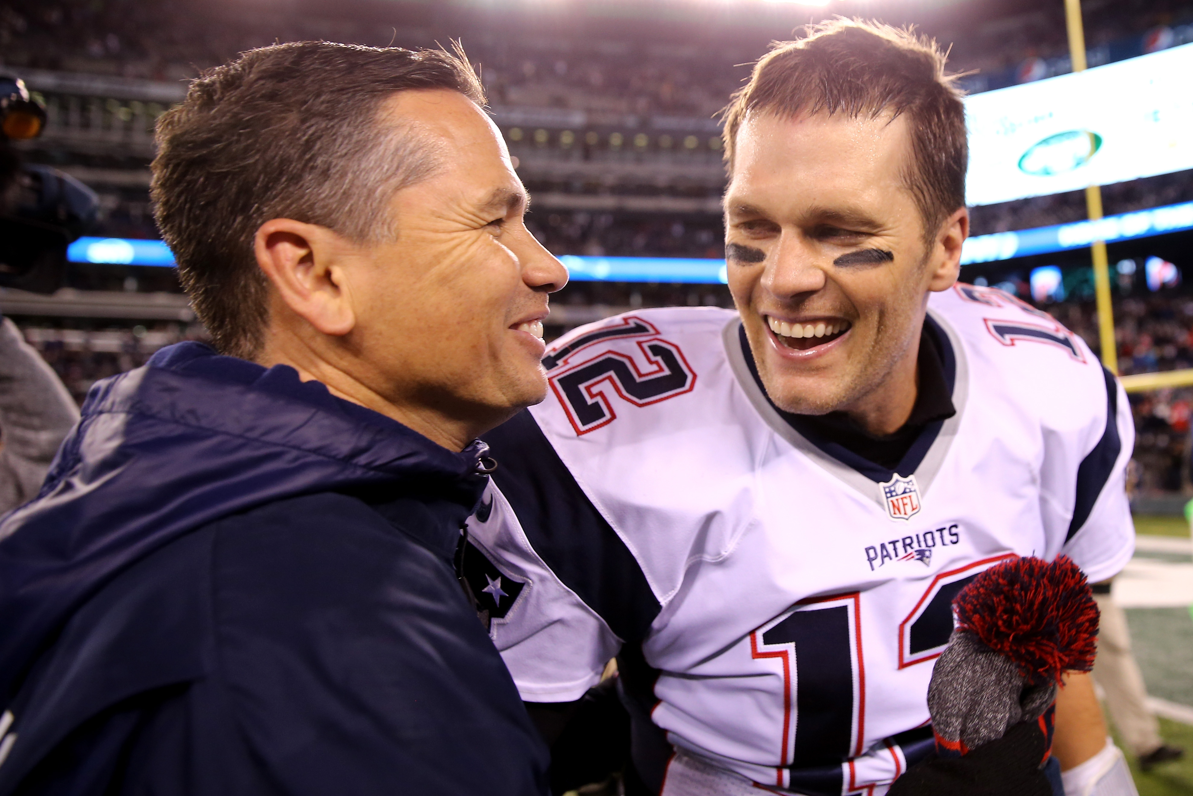 Tom Brady celebrated with Alex Guerrero after defeating the New York Jets at MetLife Stadium in November 2016.
