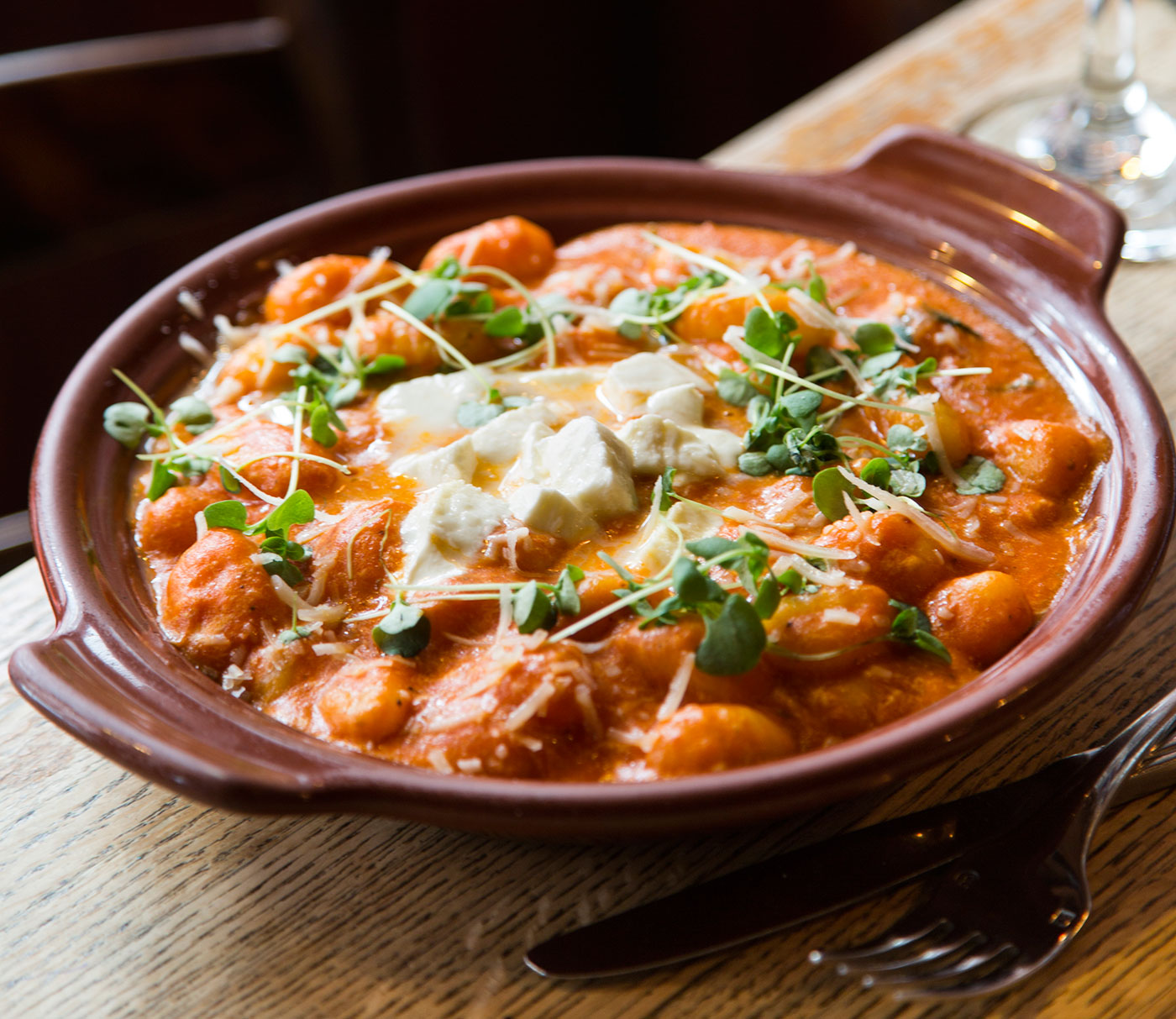 Baked gnocchi in tomato sauce at Trattoria Il Panino.