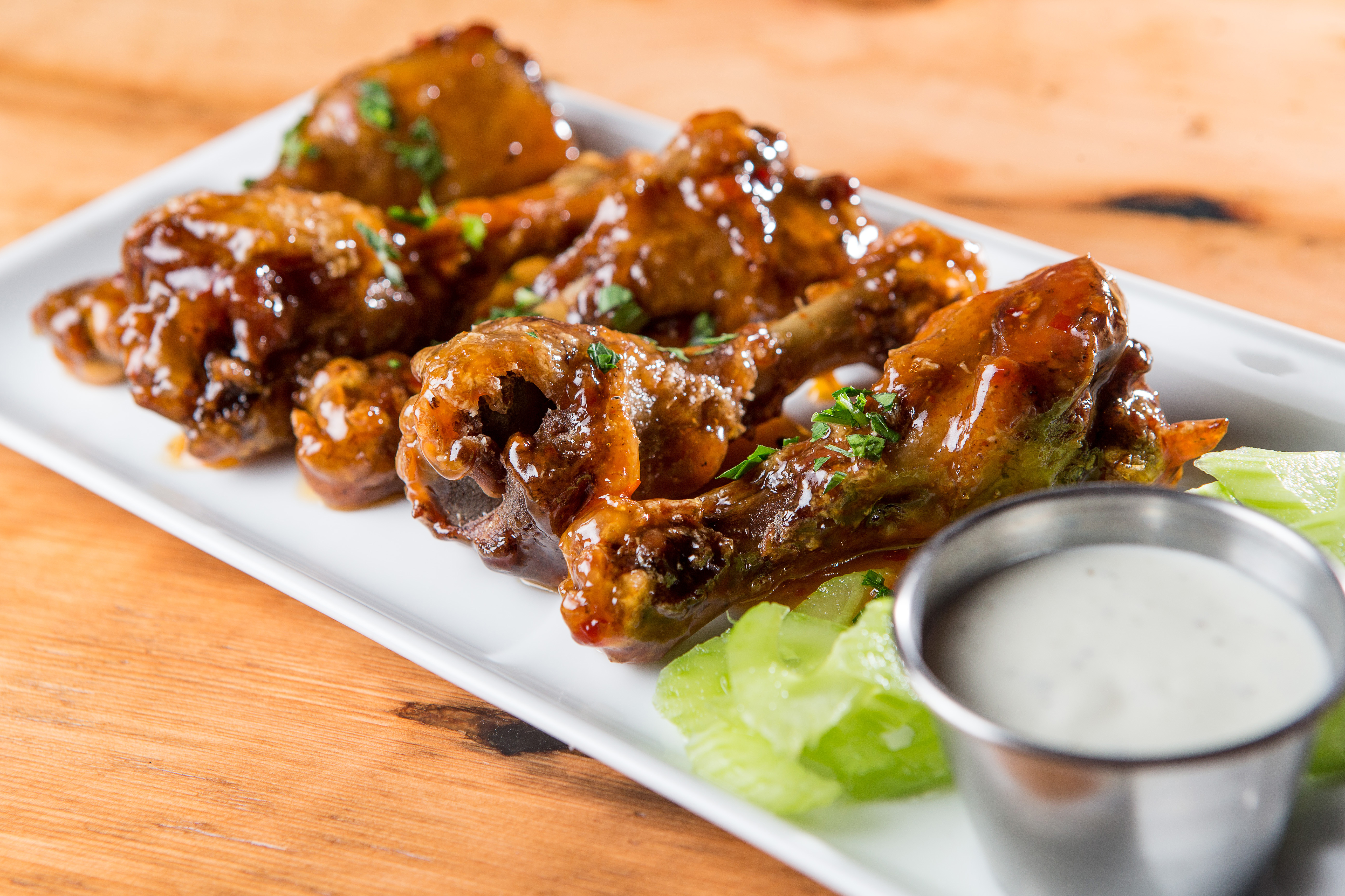 The maple-chili duck wings.