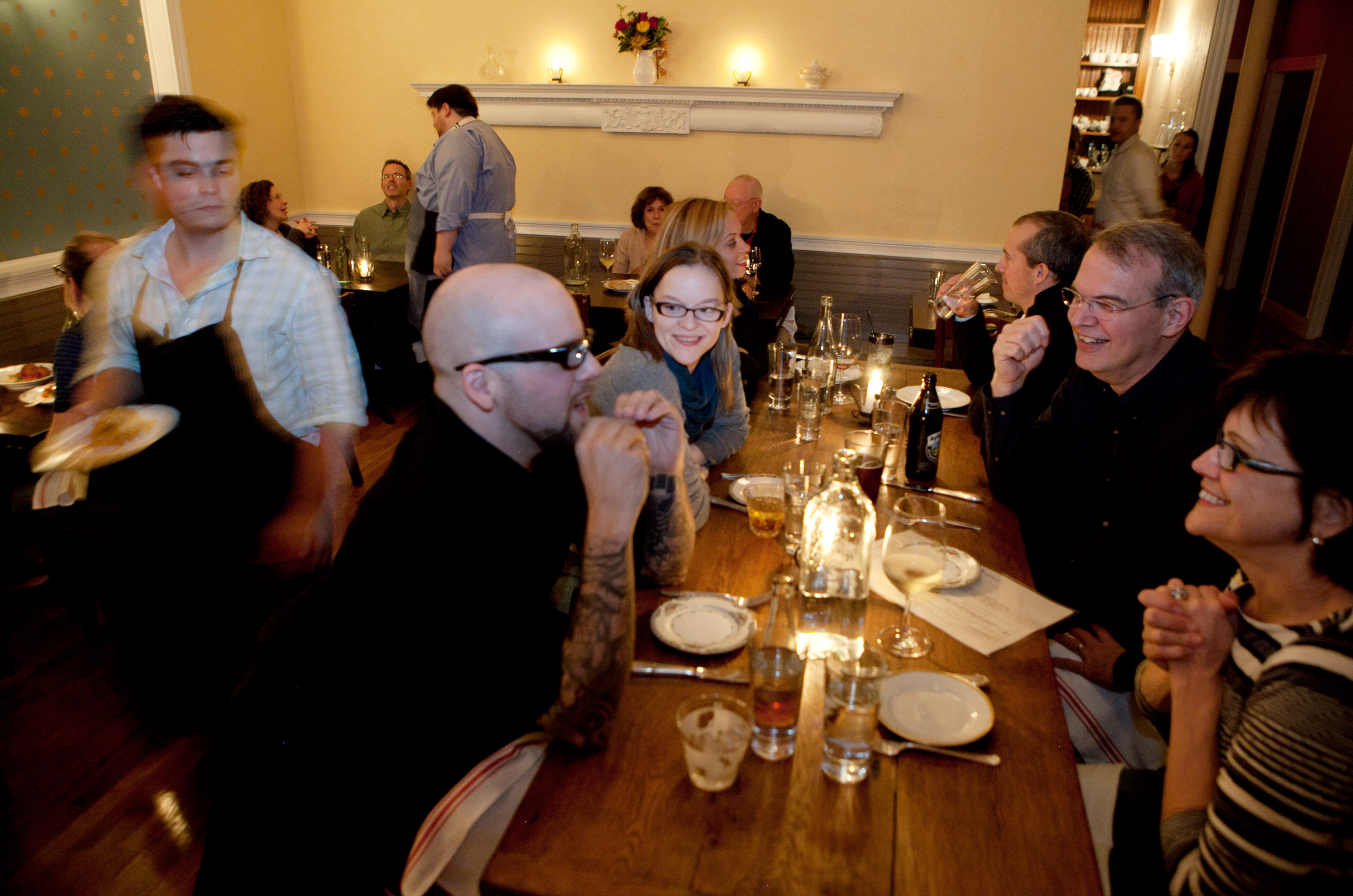 Boston, MA -- 11/01/13 -- Guests are seated at the large community table in the middle of the dining room area at Fairsted Kitchen restaurant in Brookline, Massachusetts on November 1, 2013. (Photo by Kayana Szymczak for The Boston Globe)