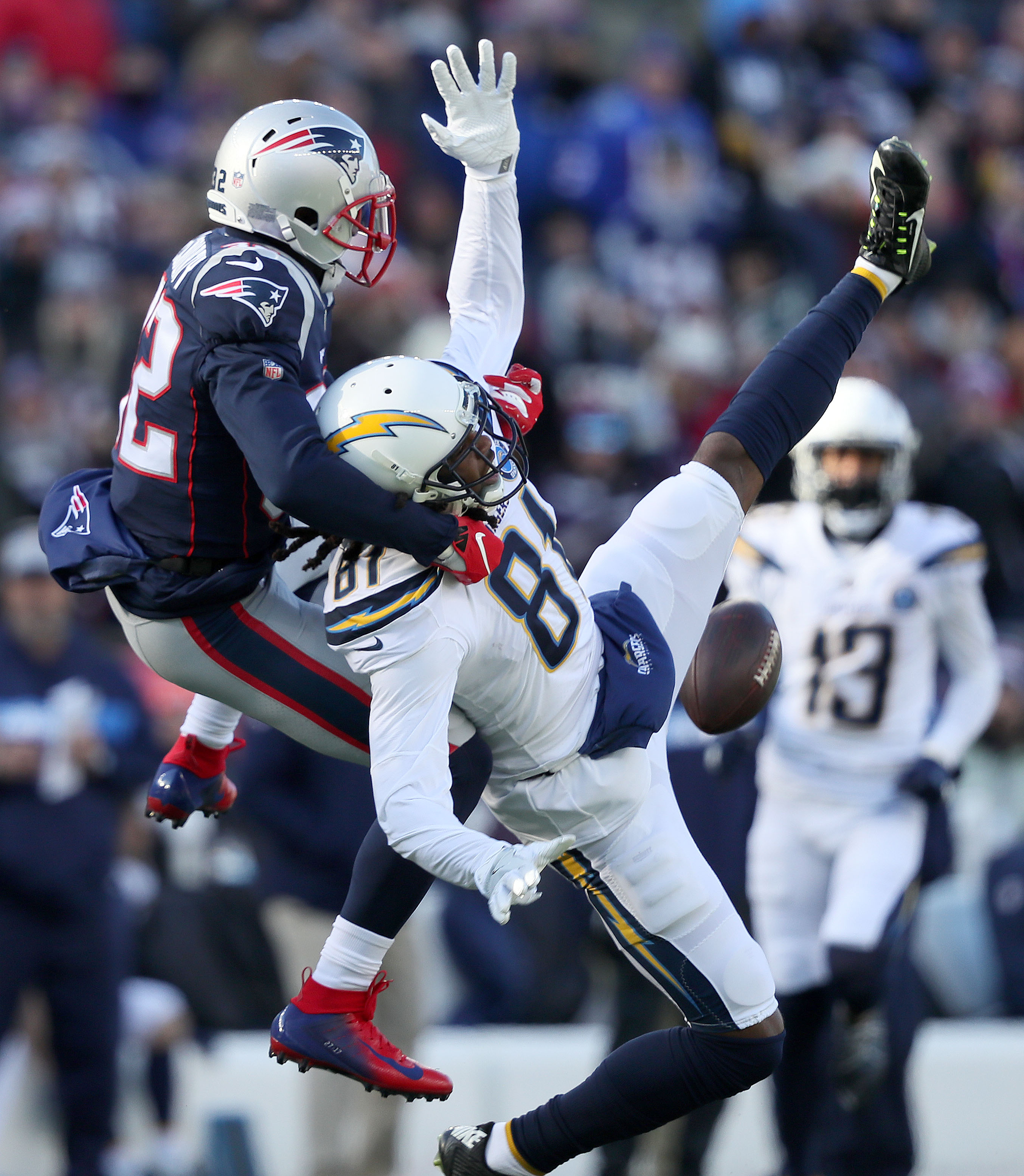 Devin McCourty (left) covered Mike Williams when Williams couldn’t come up with this pass on the Chargers’ opening drive.