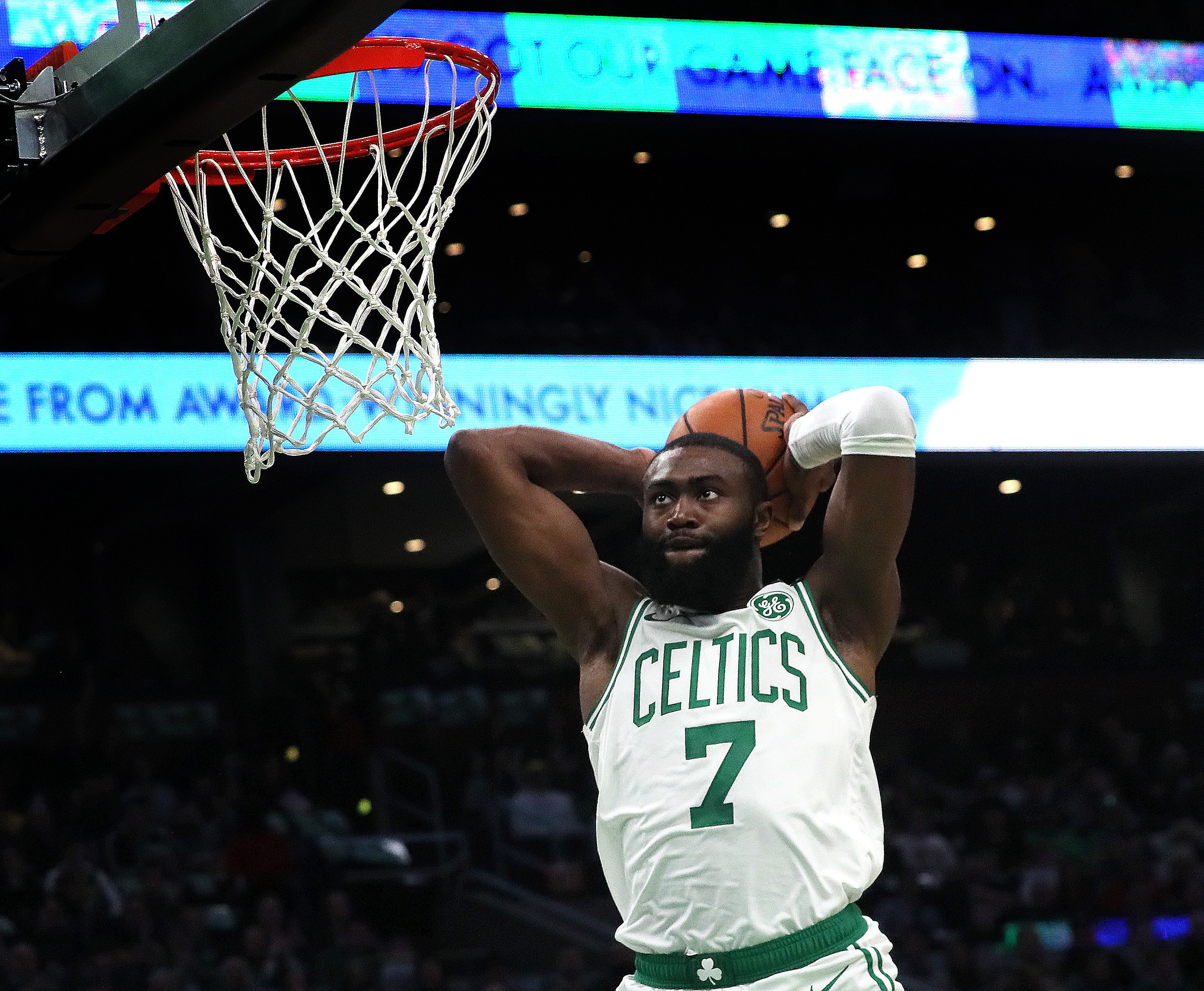 The Celtics’ Jaylen Brown swoops in for a first-quarter dunk Friday.