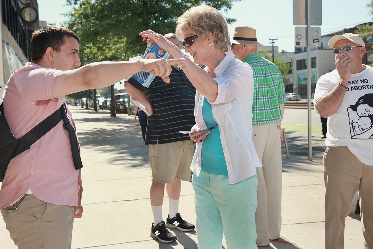 Abortion rights supporter Cameron Pond (left) and abortion protester Ruth Schiavone faced off.