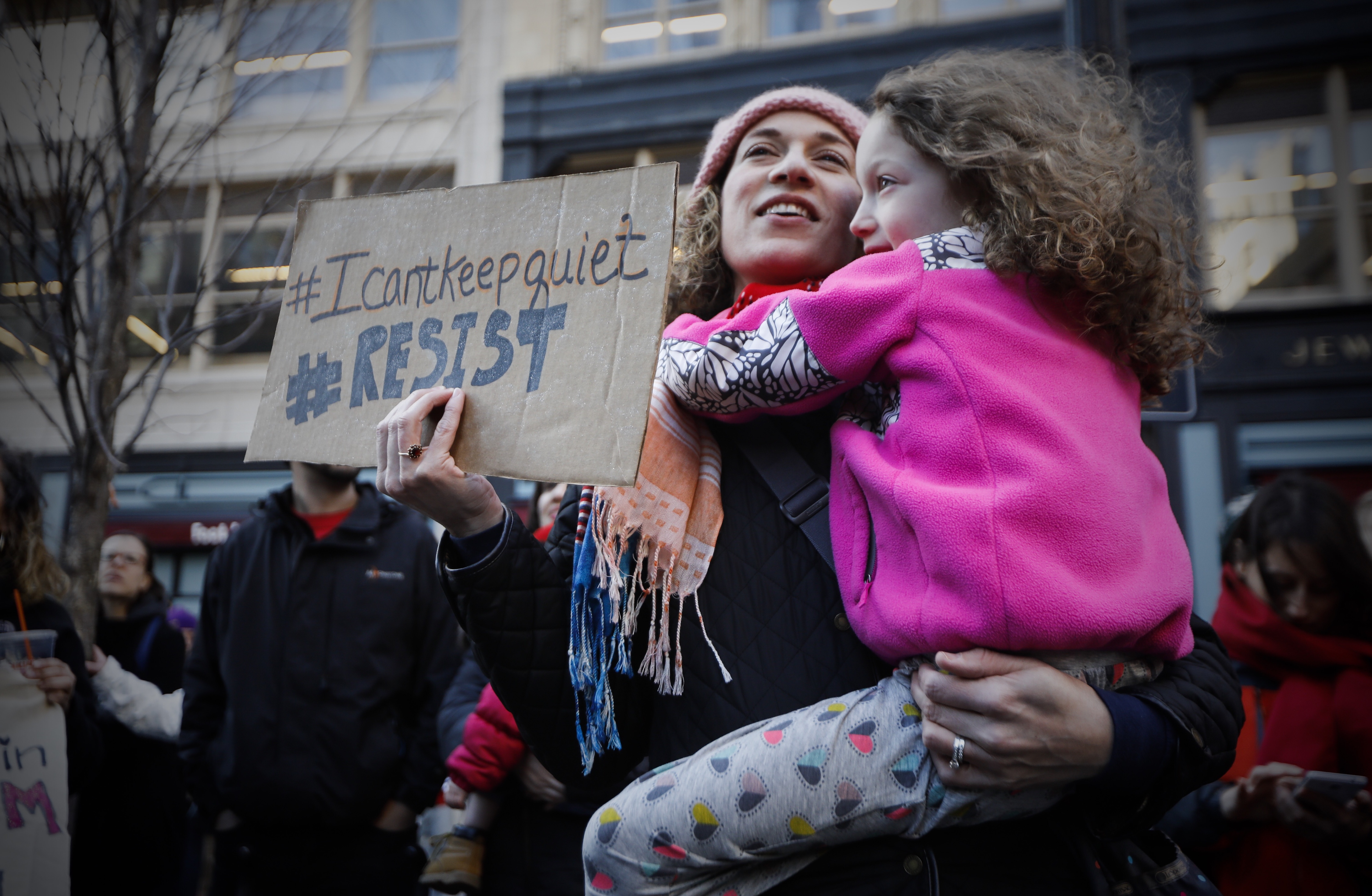 Jennifer Jones held her daughter during the Downtown Crossing rally.