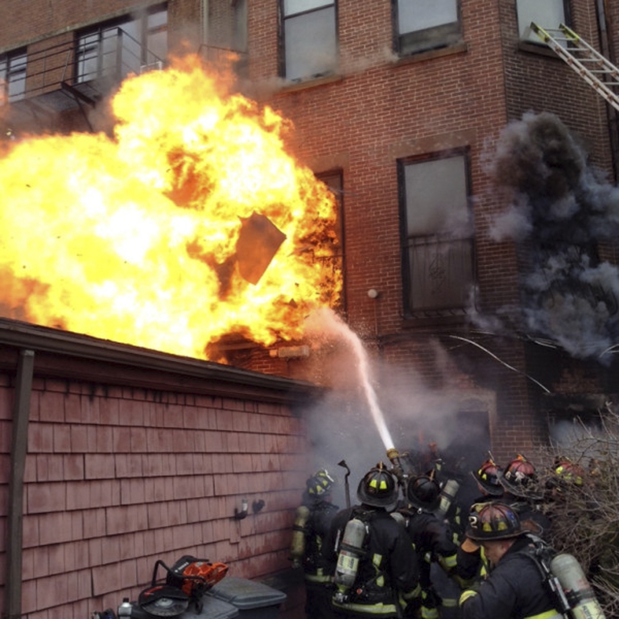 Fire officials said heavy winds helped fan the flames as the nine-alarm blaze gutted the building on Beacon Street.