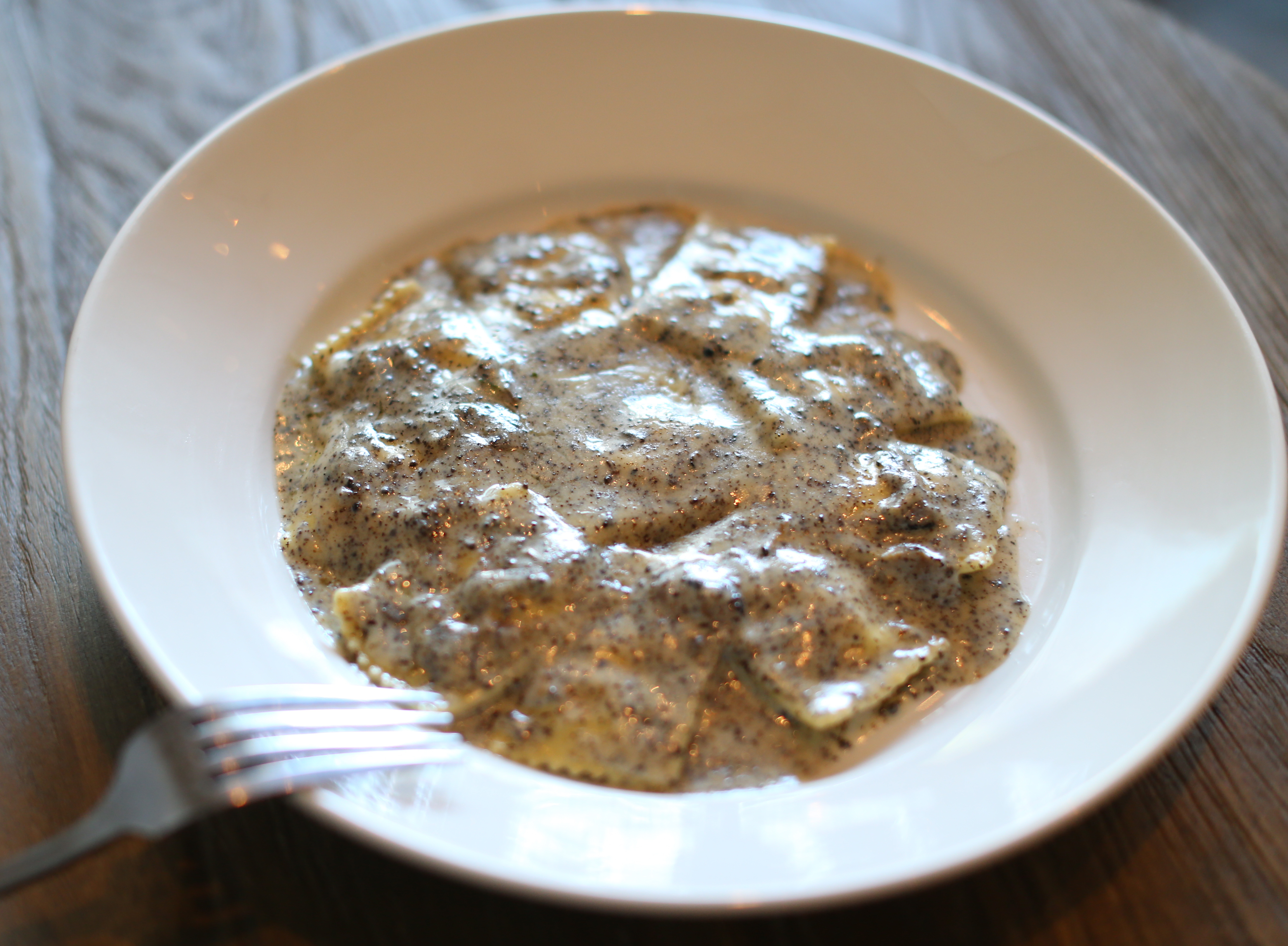 Ravioli with black truffle and butter.