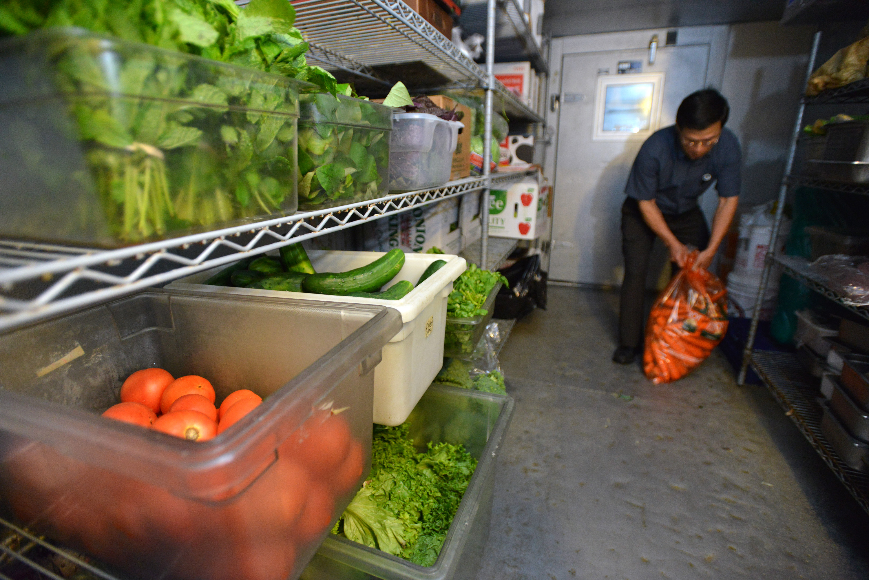 Le with what he estimated to be a two-day supply of fresh vegetables in the restaurant’s walk-in fridge.