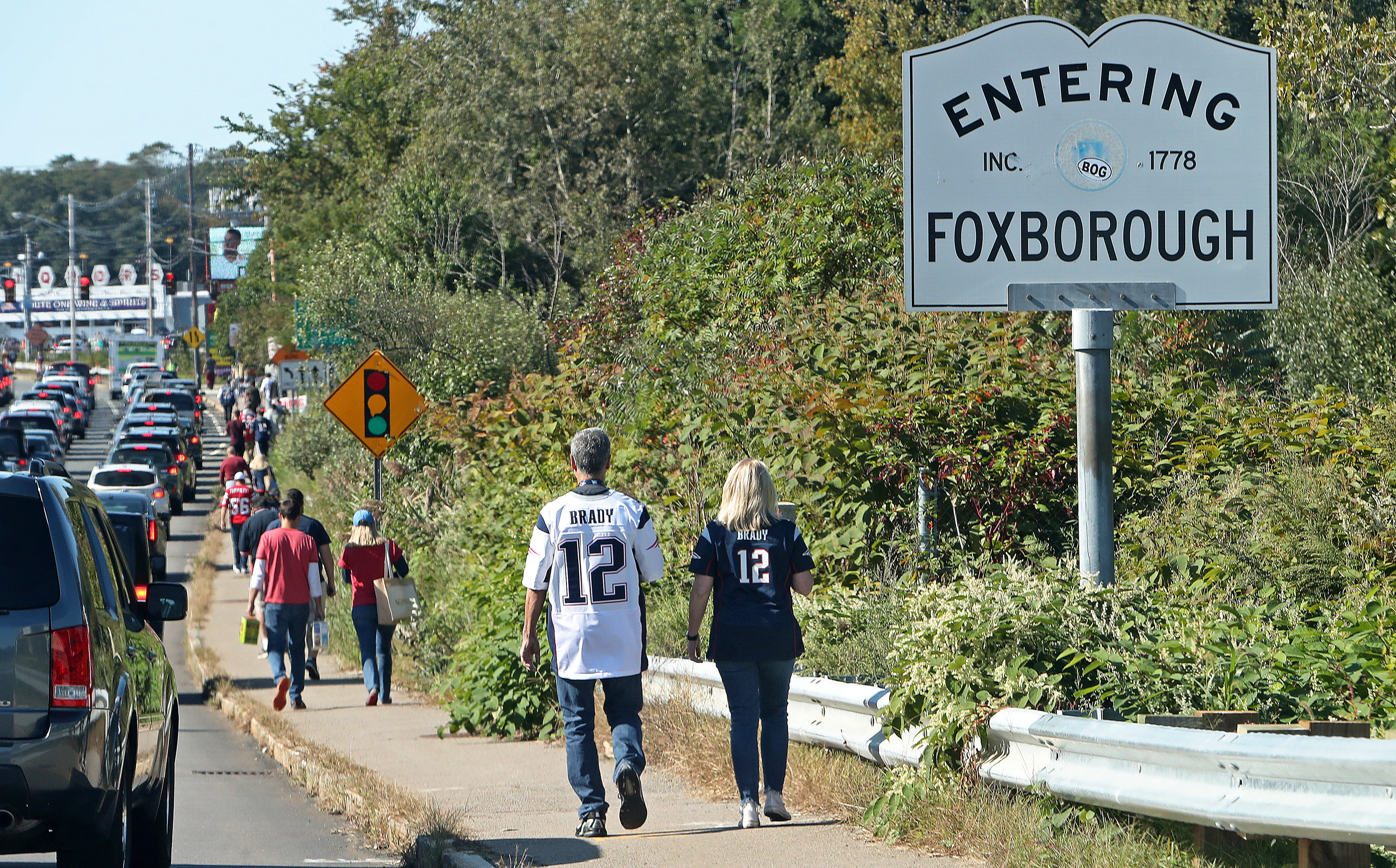 Two Tom Brady jersey wearing fans make the trek to Gillette Stadium.