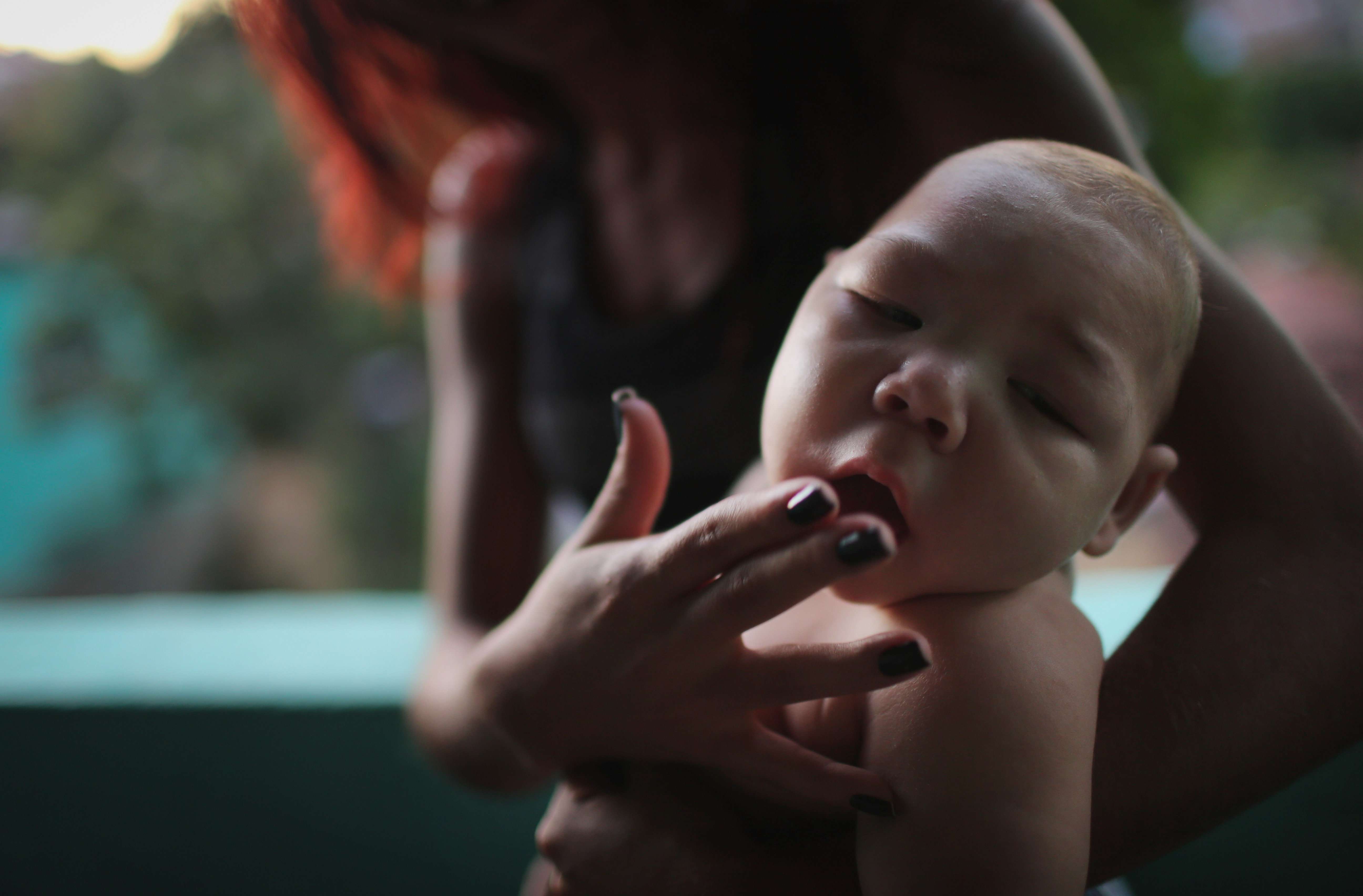 Estafany Perreira held her nephew David Henrique Ferreira, 5 months, who has microcephaly.