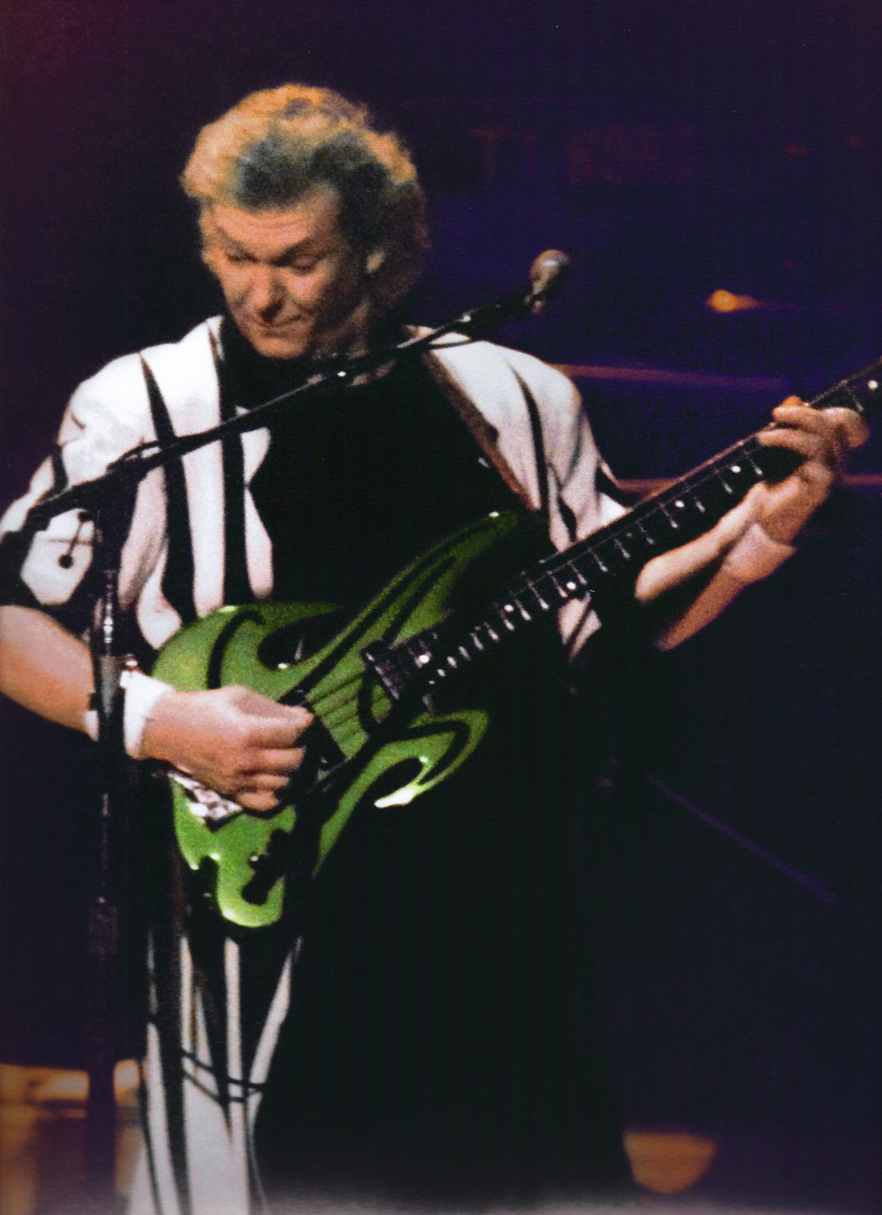 Yes’s late bassist Chris Squire, with a guitar crafted by Mr. Mouradian.
