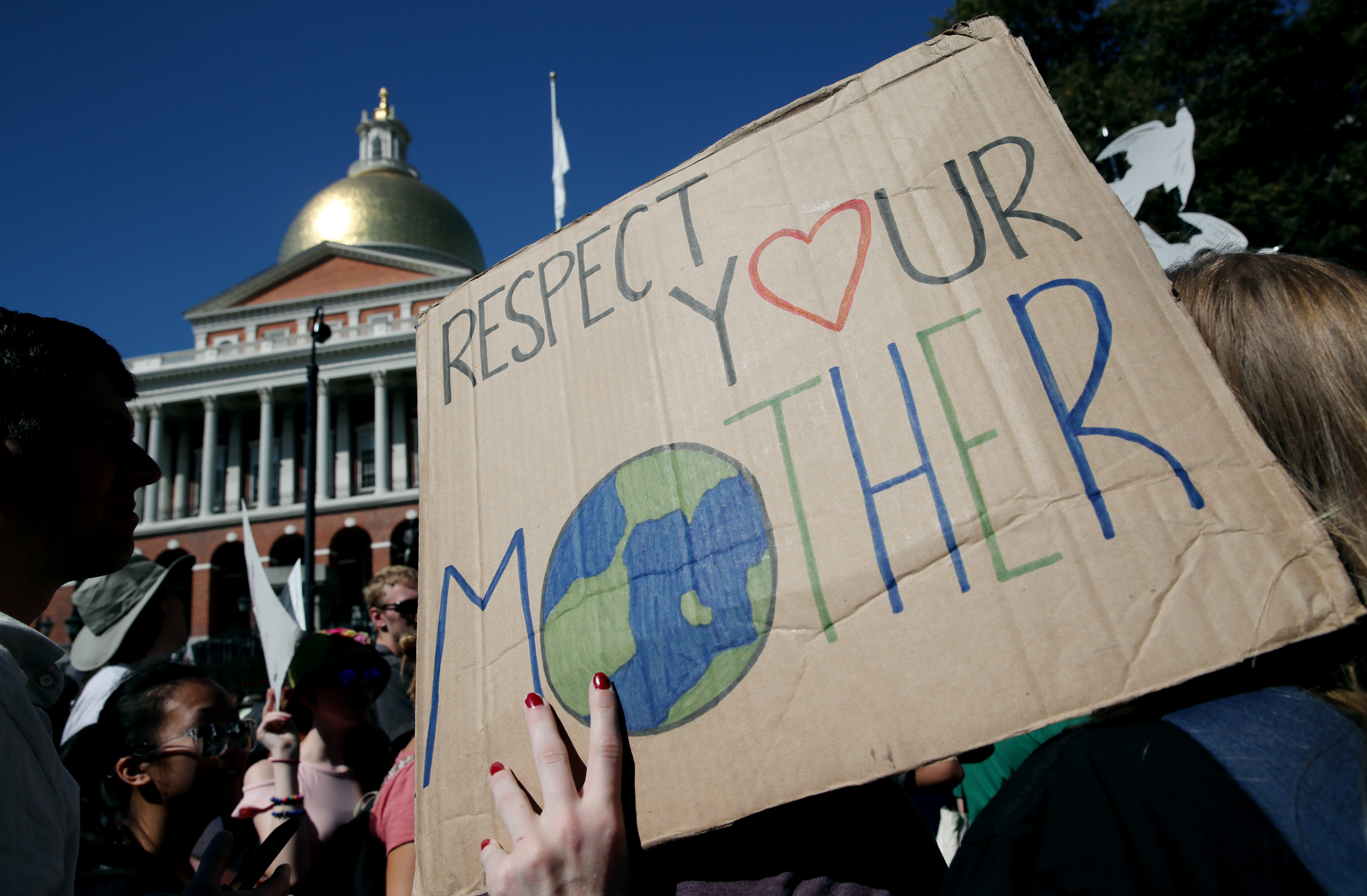 Demonstrators marched to the State House.