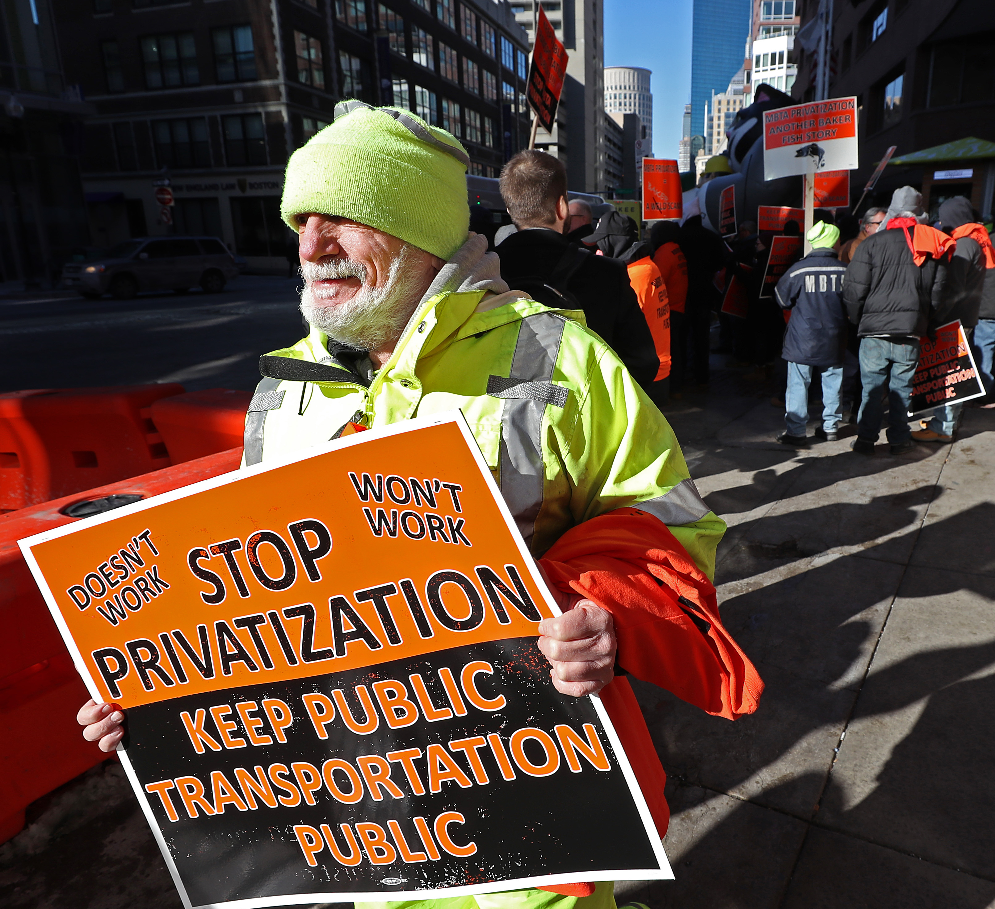 Bus mechanics protested outside the Transportation Building downtown.