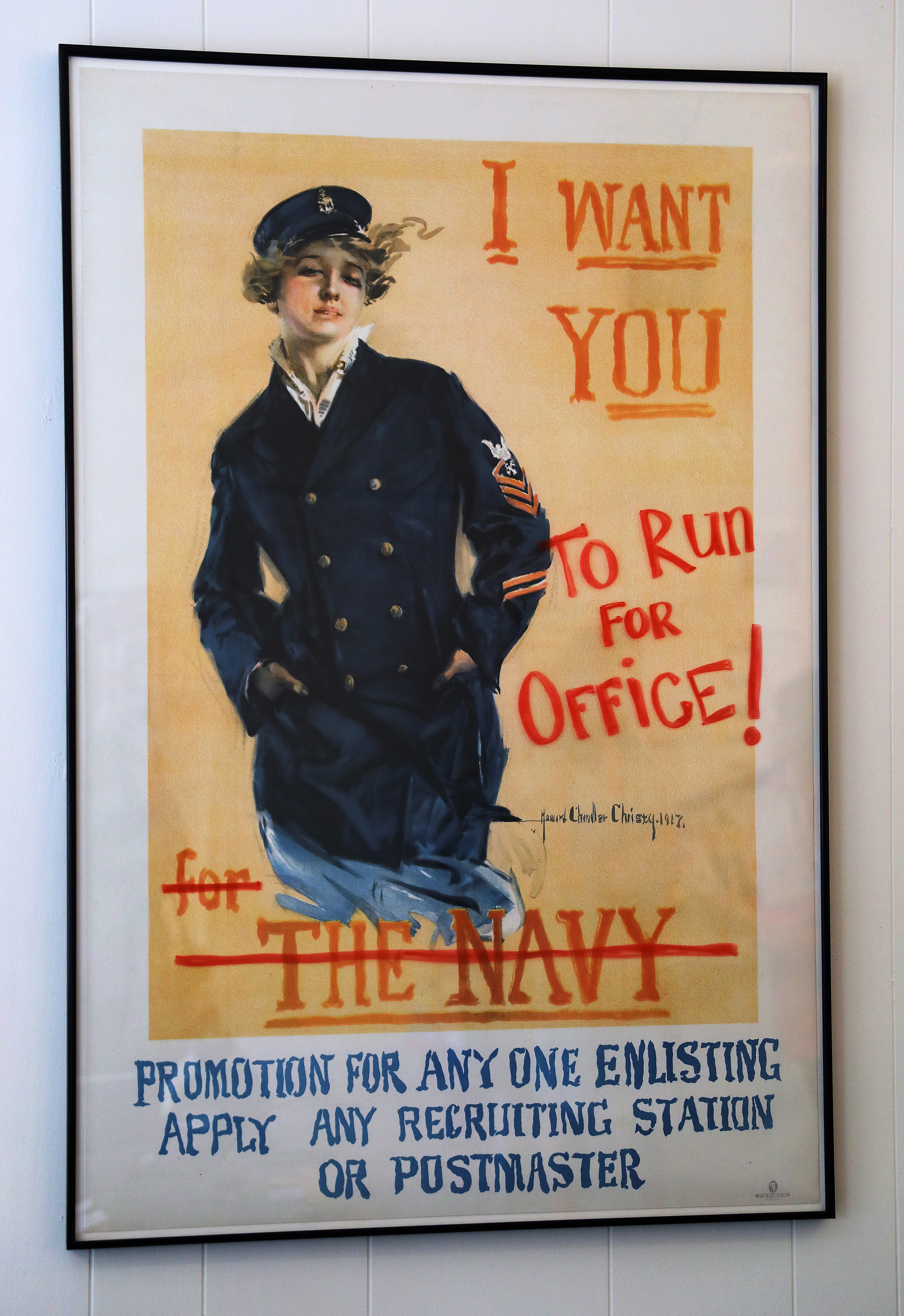 A framed poster in Lee’s office.