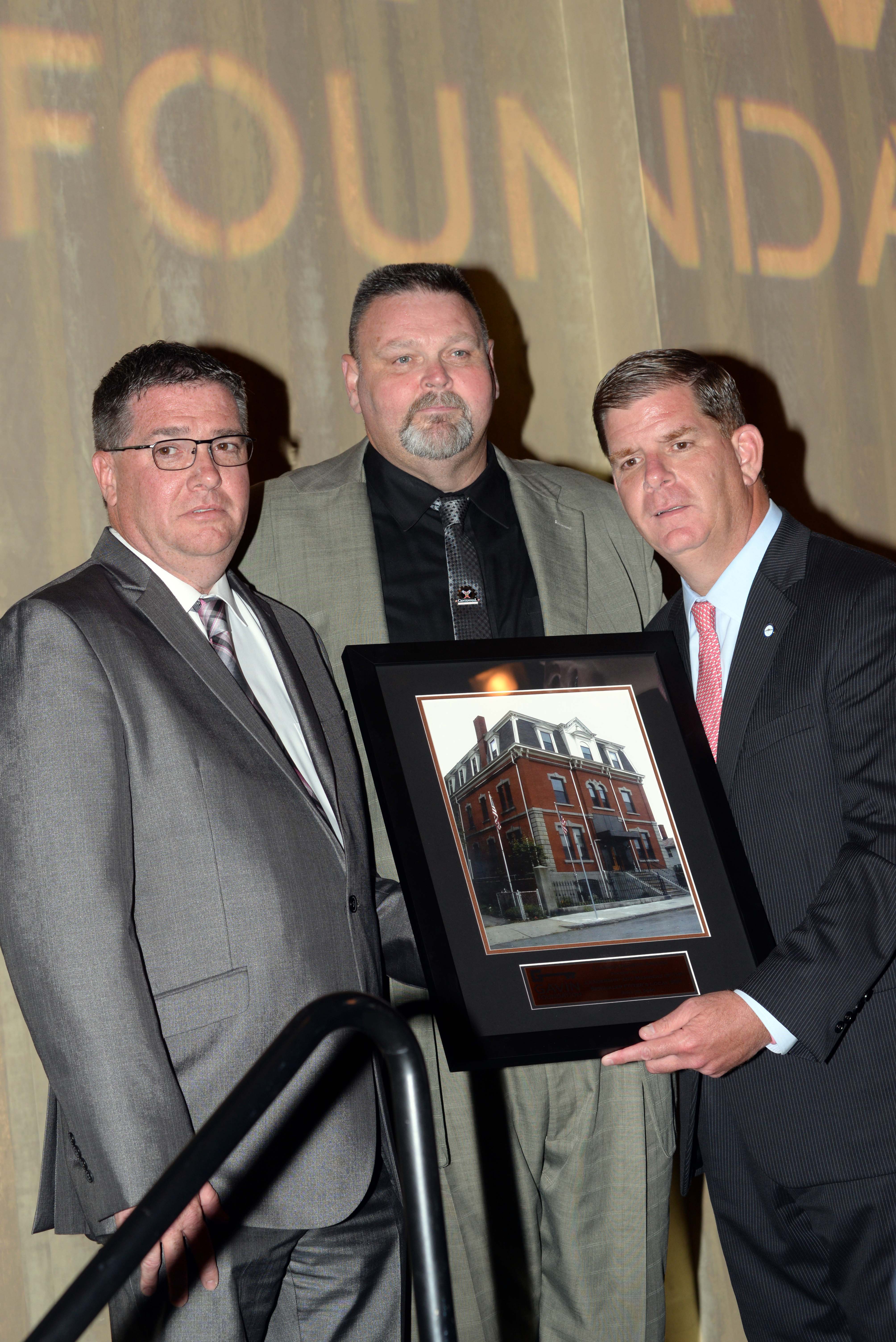 Mayor Martin J. Walsh offered remarks and presented the “Caring Hearts Award” to the leadership and members of the Sprinkler Fitters and Apprentices of Local 550 at the Gavin Foundation’s Open Hearts Open Homes event. Mark Fortune is in center.