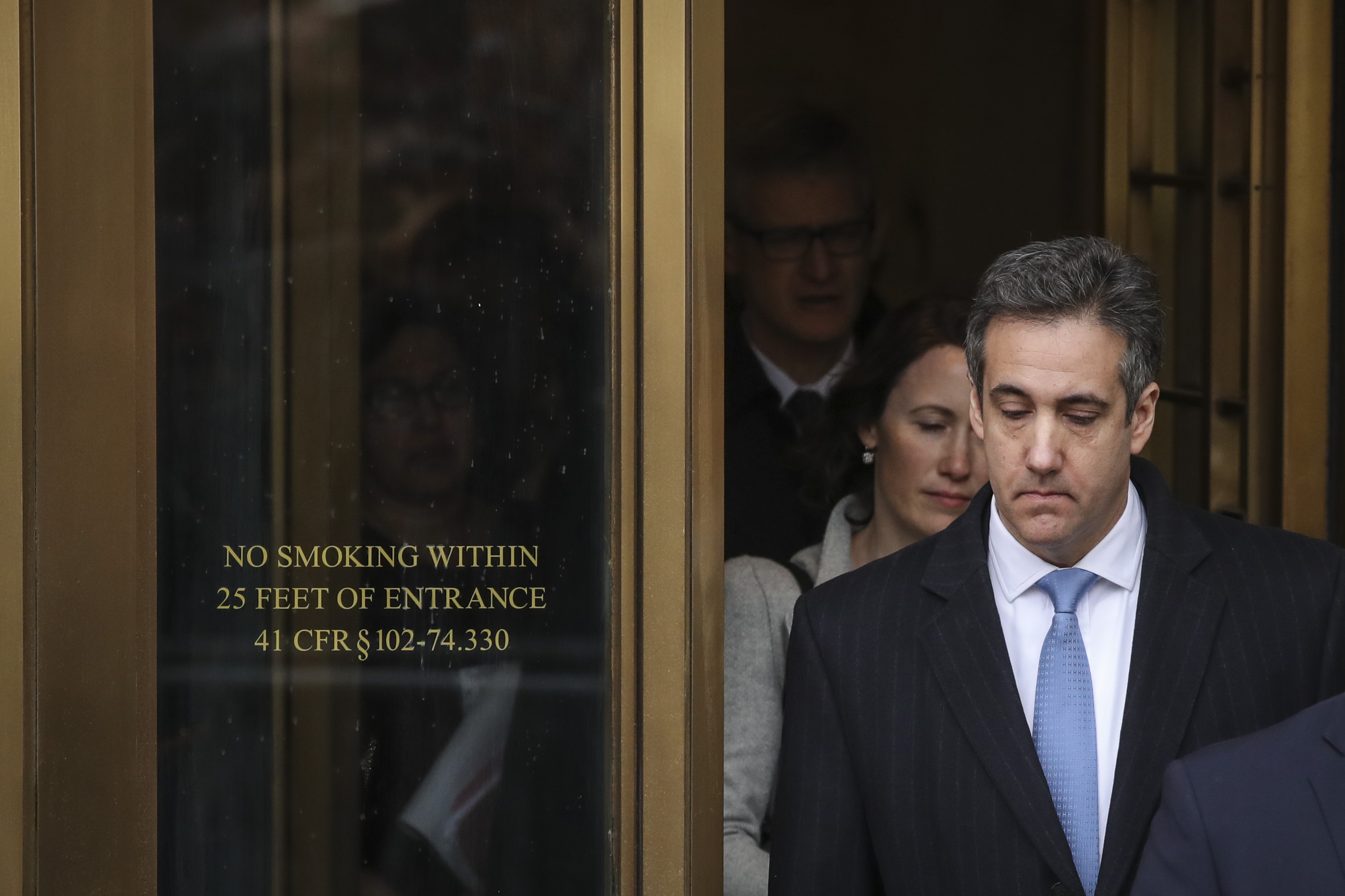 Michael Cohen, President Trump's former personal attorney and fixer, exited federal court after his sentencing hearing on Wednesday.