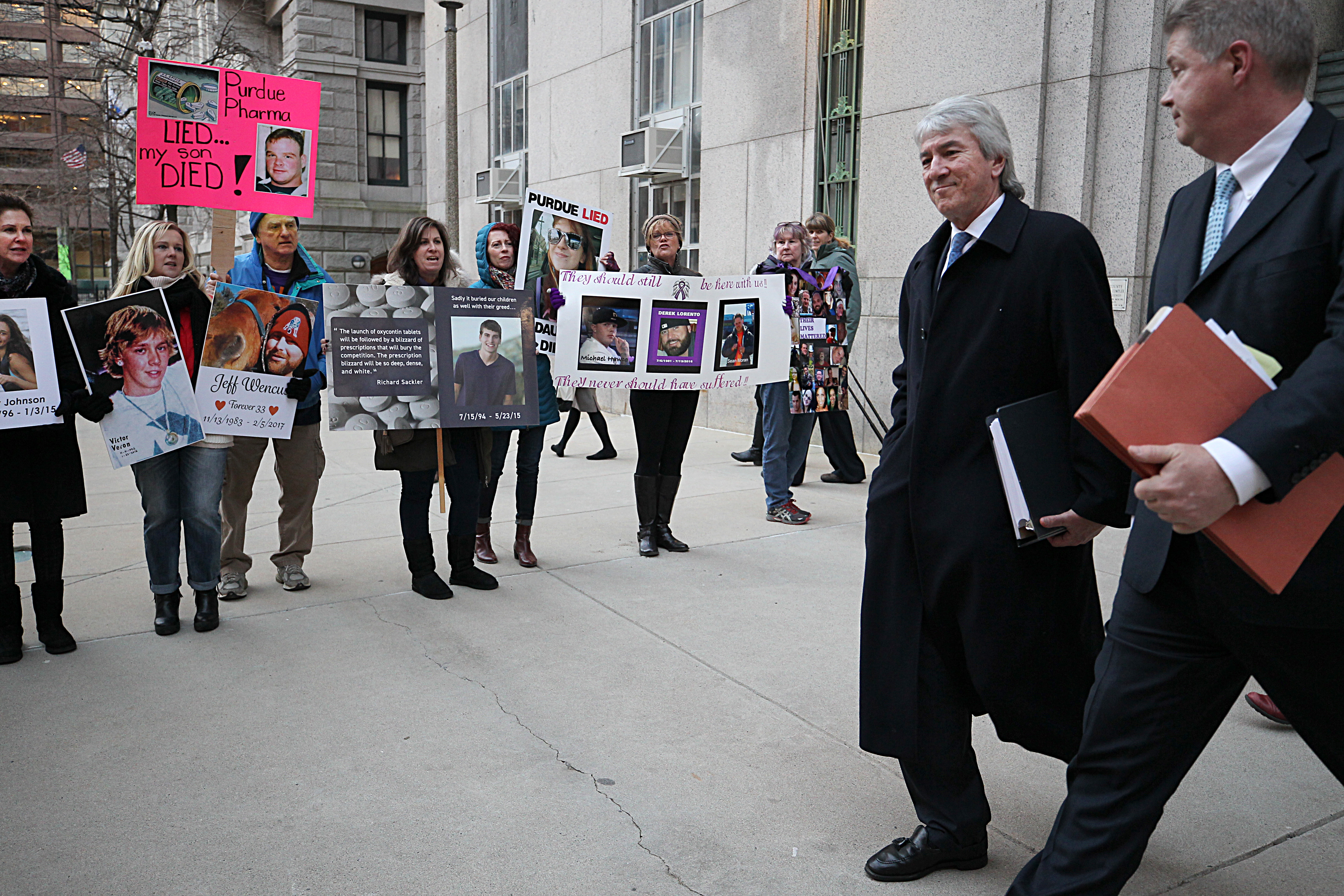 Lawyers for Purdue Pharma exited the courthouse for a status update in Attorney General Maura Healey’s suit against the company.