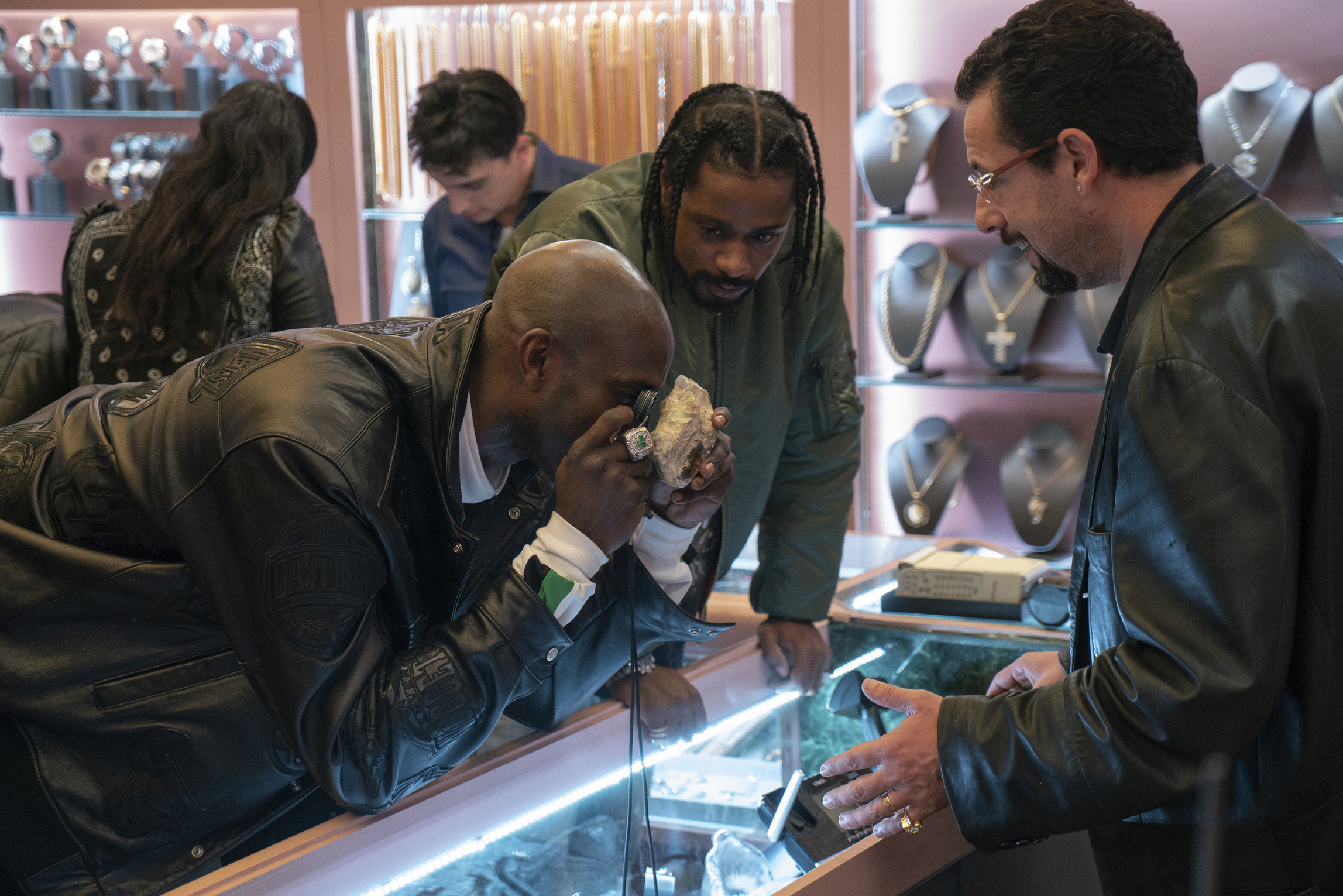 Kevin Garnett (left), Lakeith Stanfield, and Adam Sandler in "Uncut Gems."