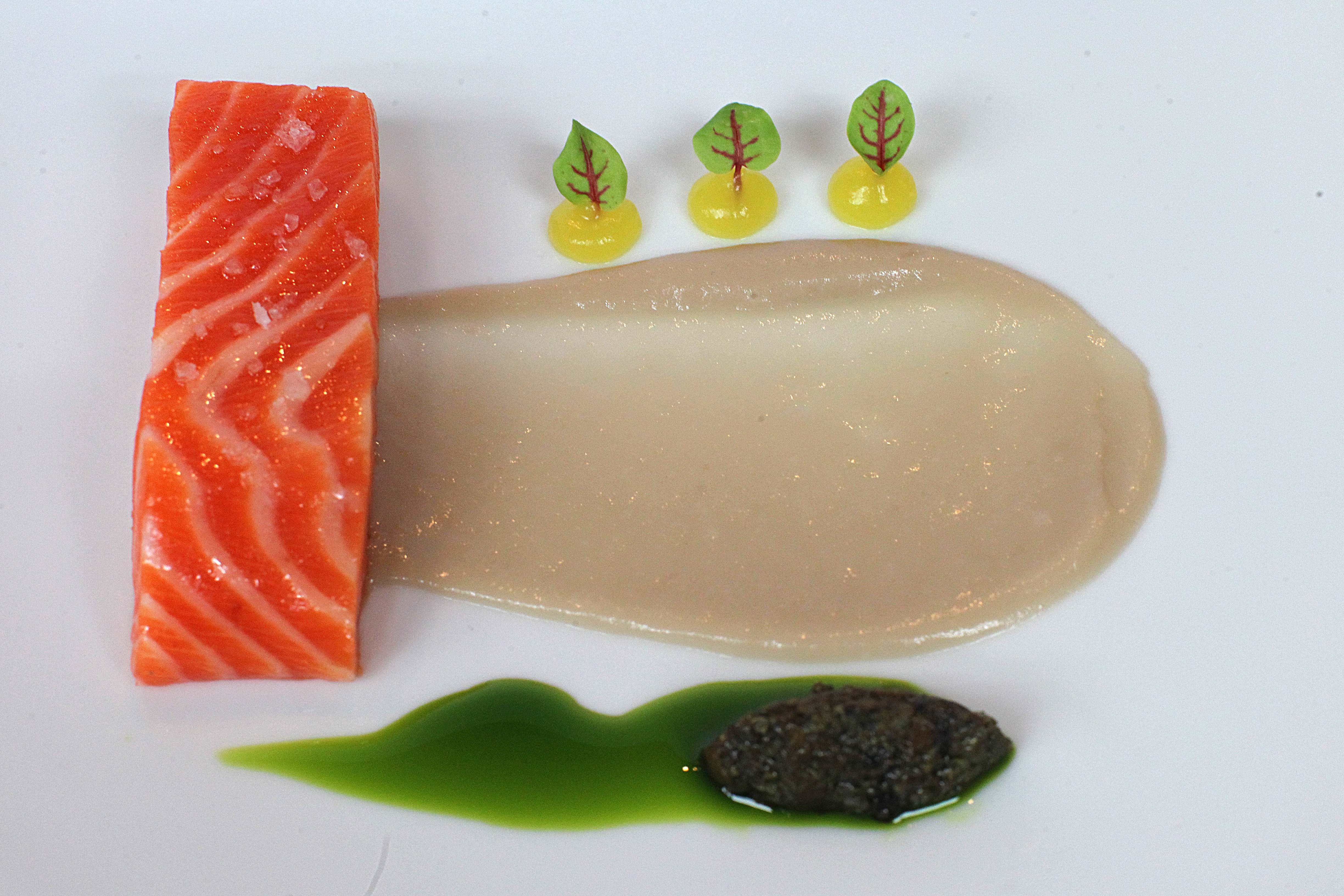 Coral ocean trout with orange blossom gel and fermented soybeans.