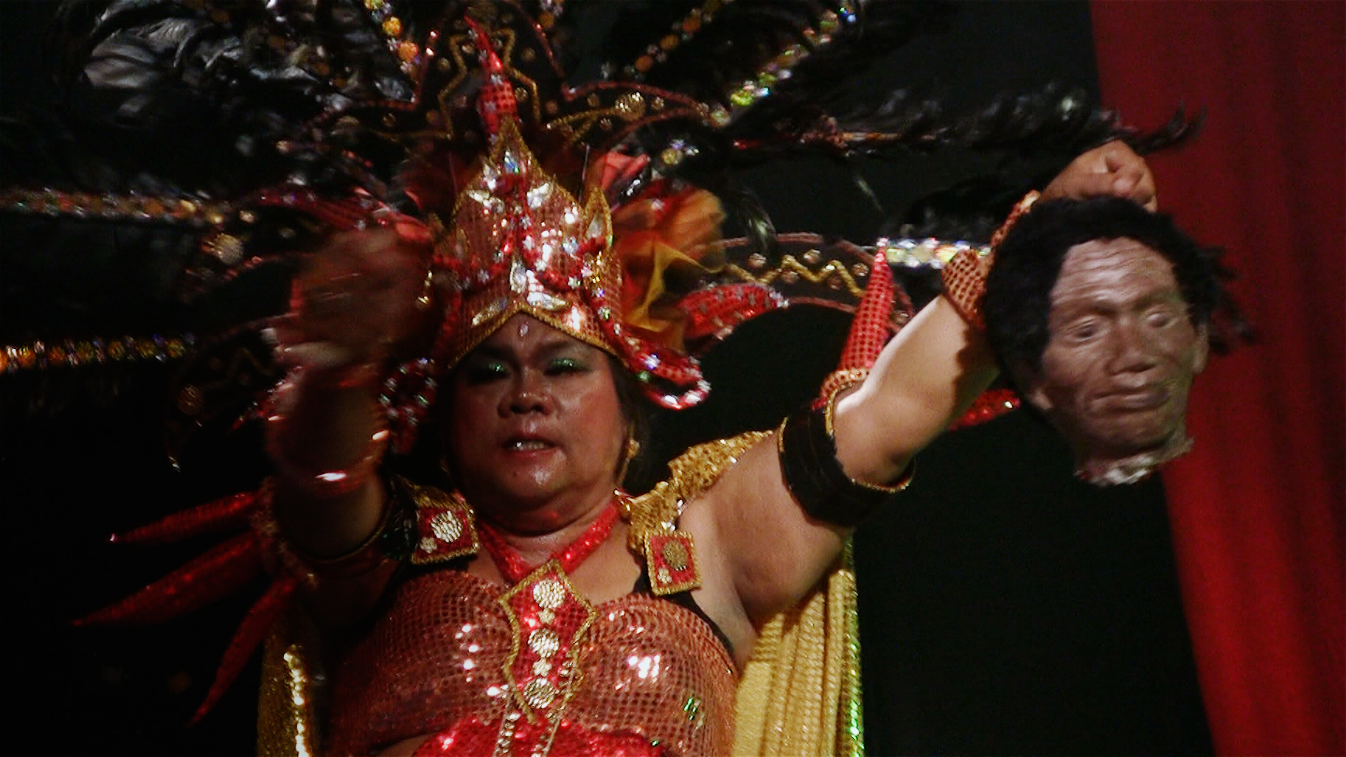 Herman Koto, a gangster frequently seen in drag, in “The Act of Killing.”