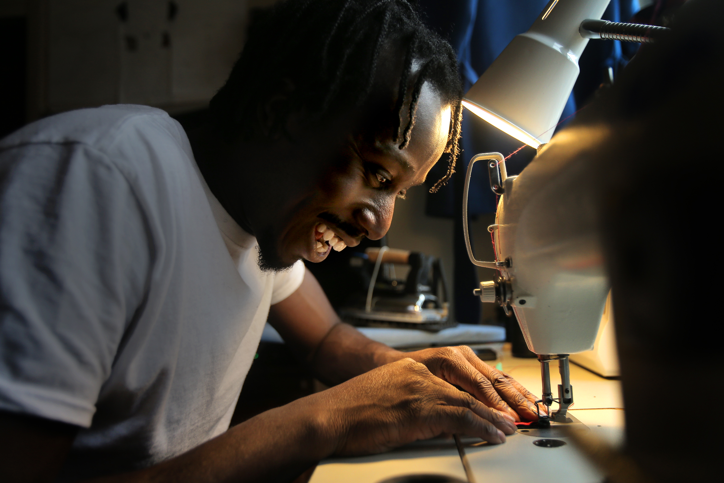 Bennett demonstrated how he makes his bowties.