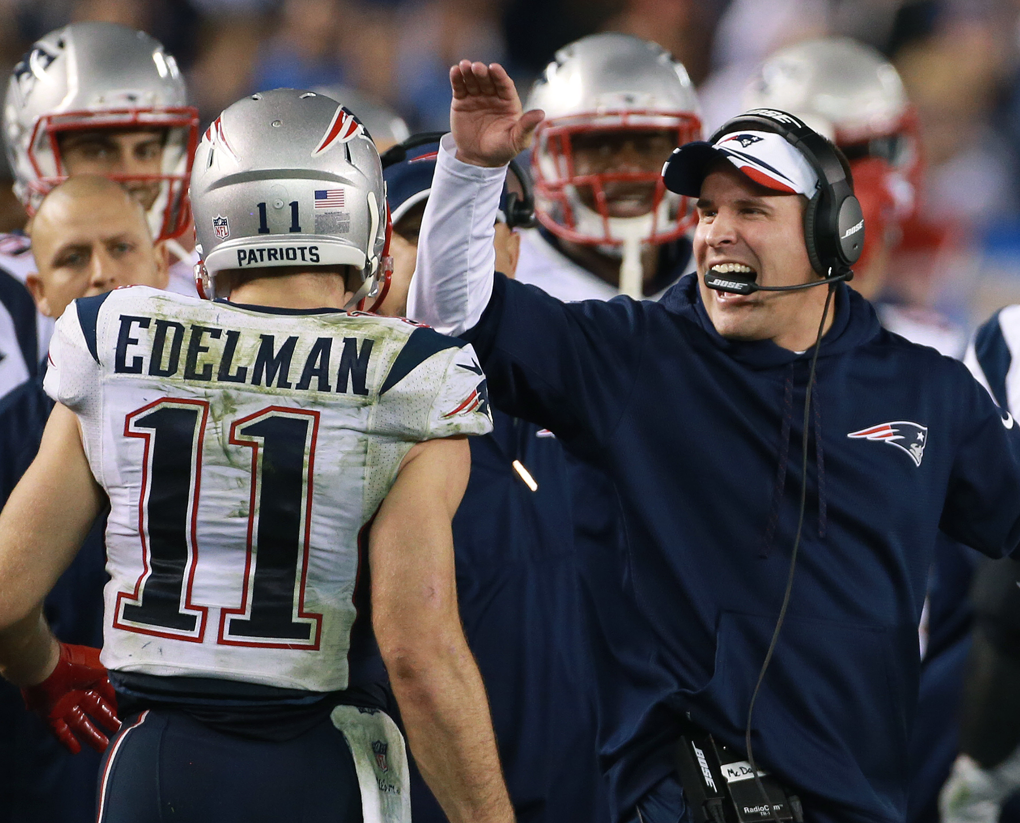 Patriots wide receiver Julian Edelman was greeted by offensive coordiantor Josh McDaniels following his fourth quarter touchdown.