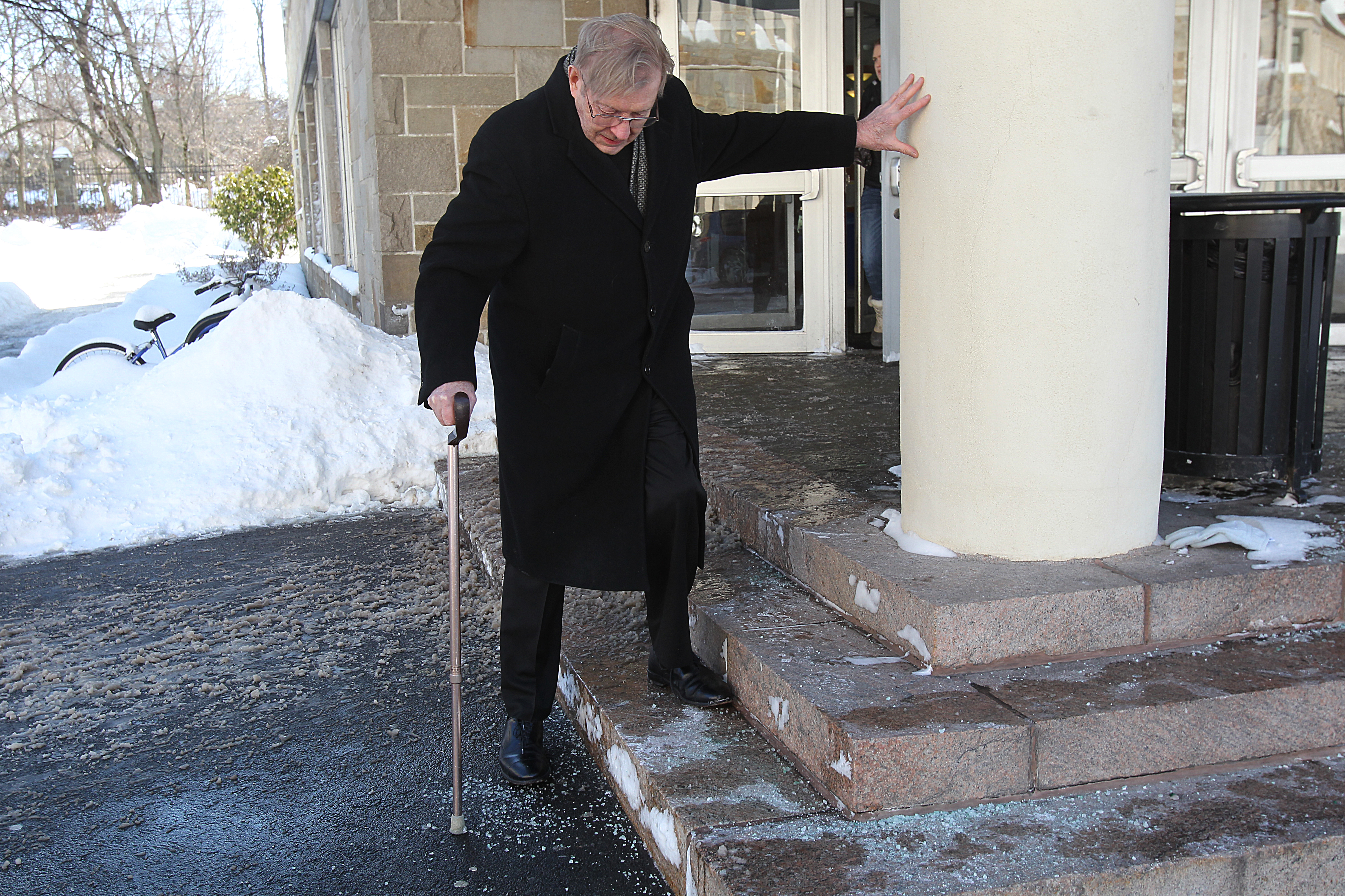 “There are a lot of issues, and the school is rather careless about the whole thing,” said Rev. Raymond Helmick, a professor in the theology department, pictured here on the steps of the McElroy Commons building.