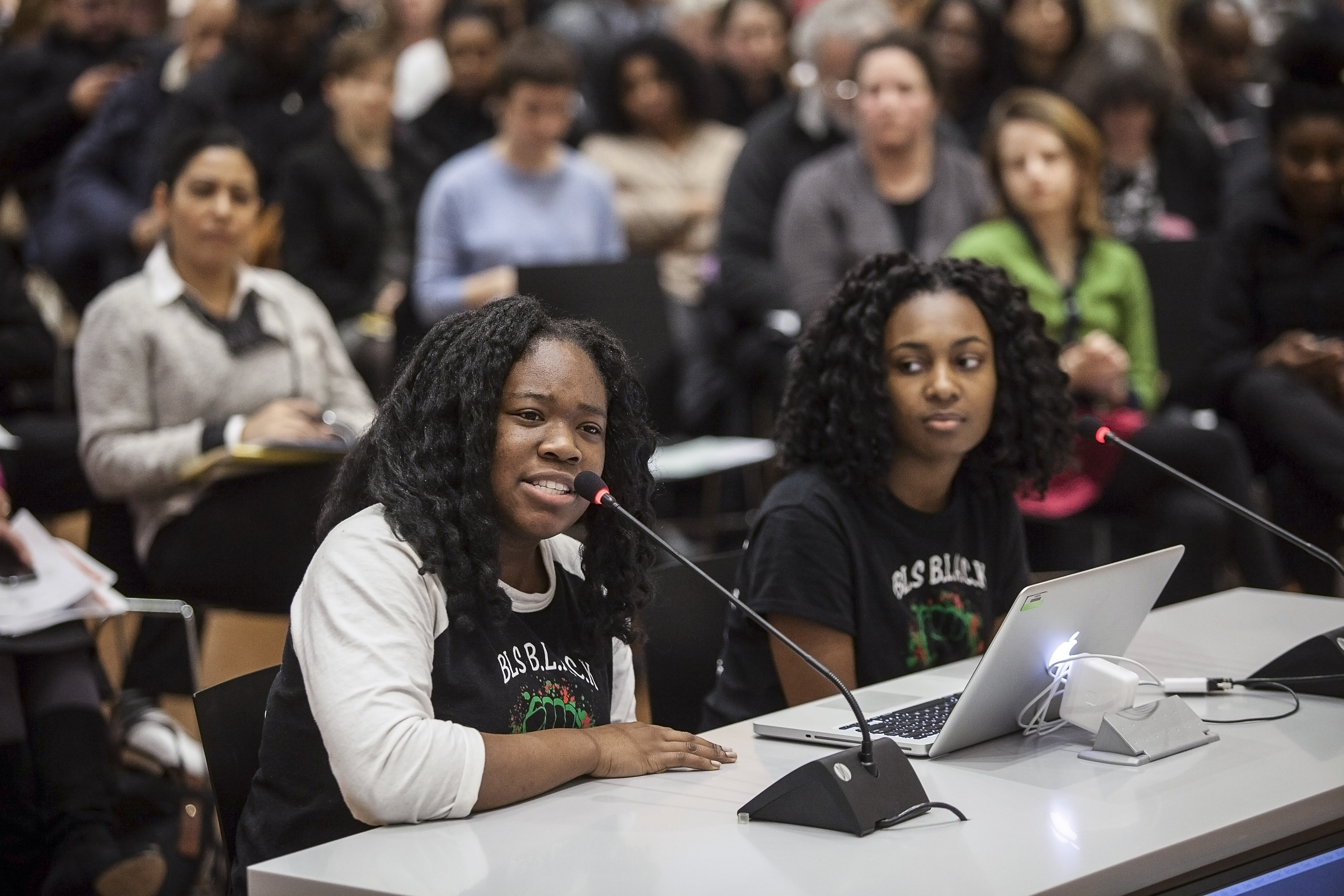 Meggie Noel (left) and Kylie Webster-Cazeau, who said in a YouTube video that Latin School students are often subjected to racial slurs and insensitive remarks, spoke at a School Committee meeting Wednesday.