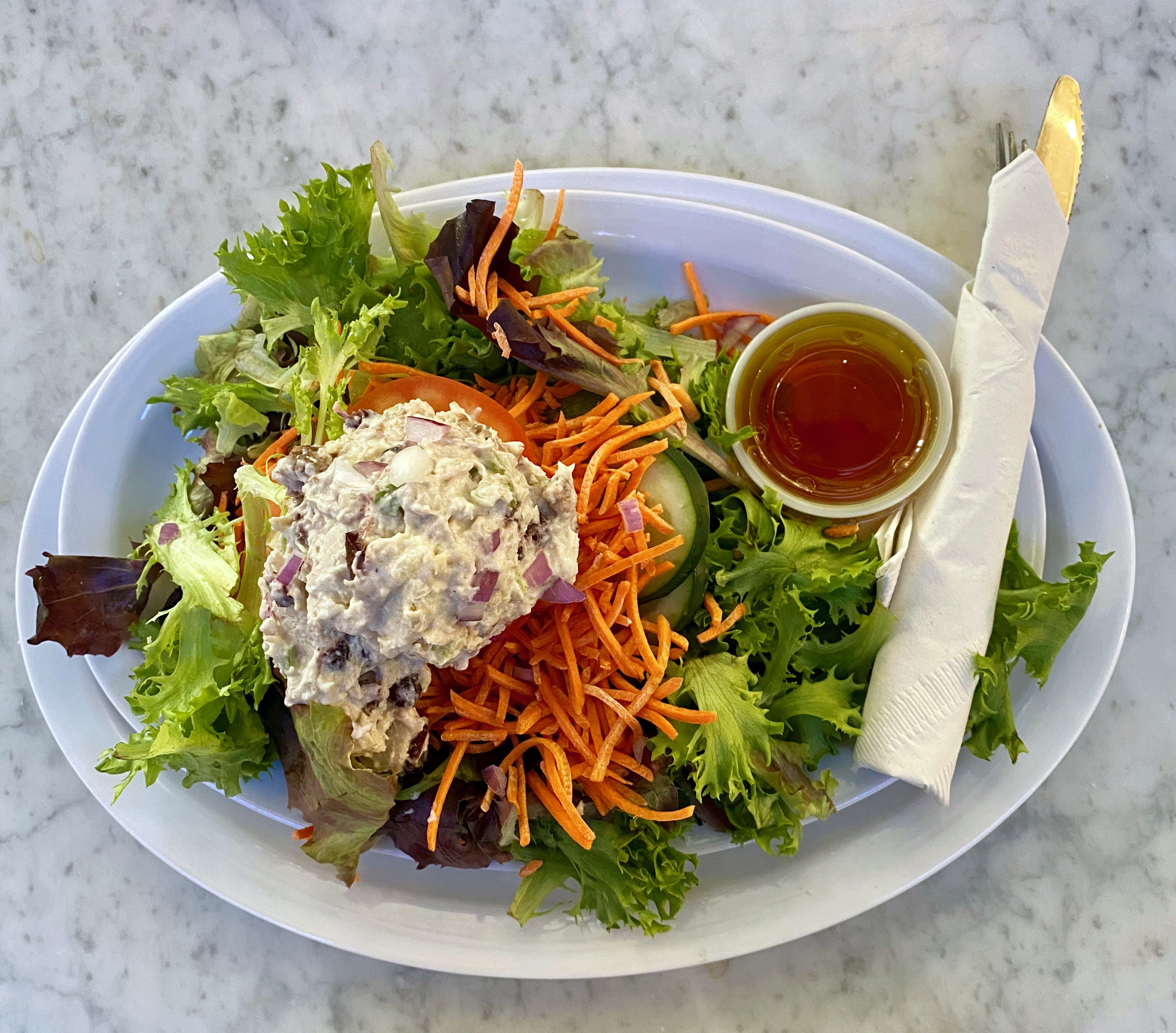Lucky Finn’s garden salad, with a scoop of cranberry walnut chicken salad.