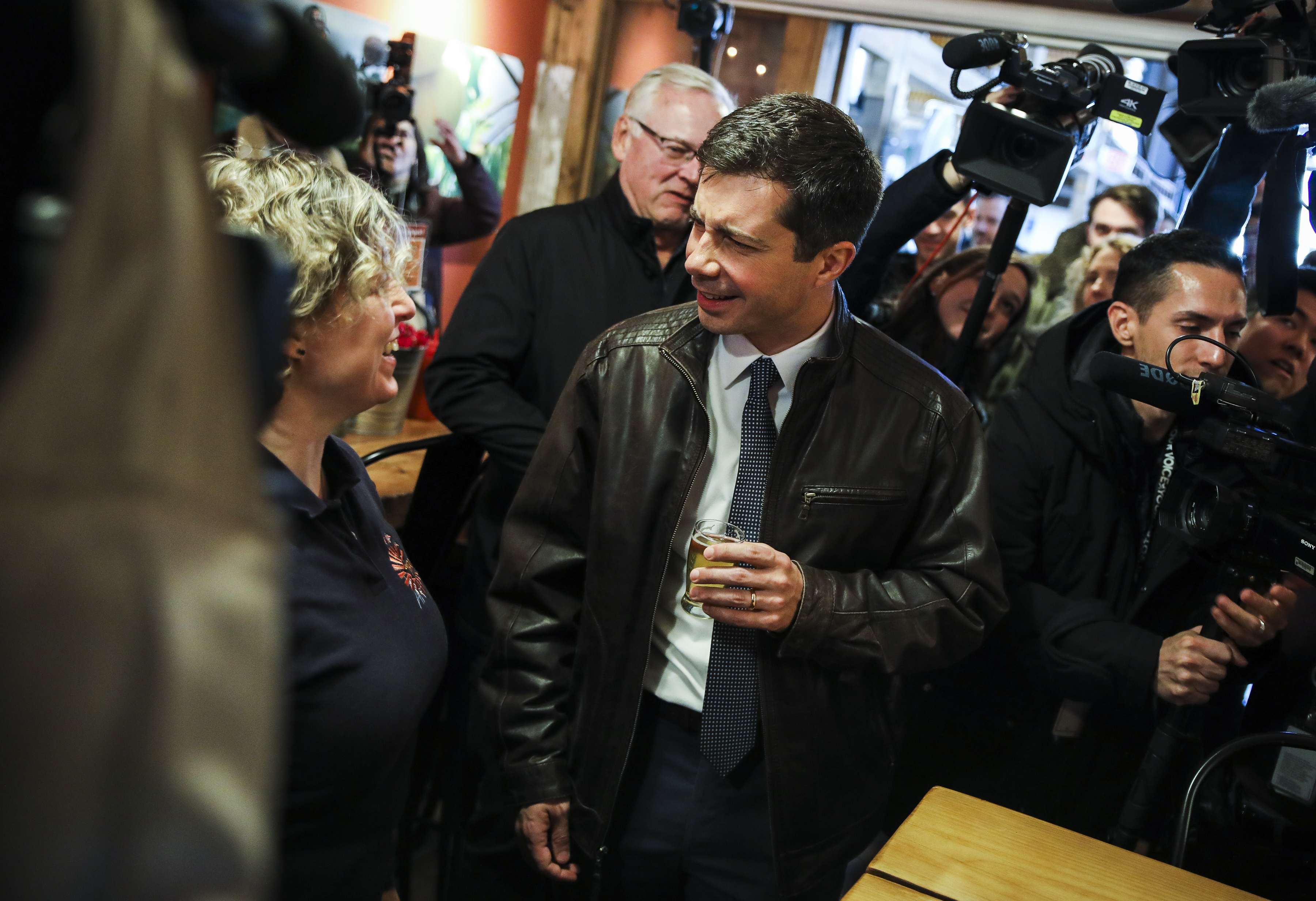 Pete Buttigieg reacted after smelling a brew handed to him by Nicole Carrier, Co-Founder & President at Throwback Brewery, a women-founded and locally sourced restaurant in North Hampton, N.H.